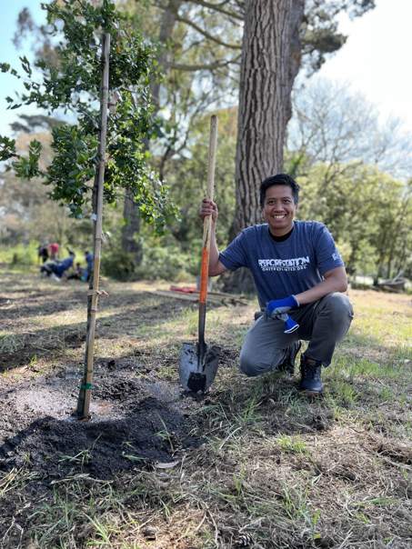 GroupGreeting founder Anthony Doctolero planting a tree