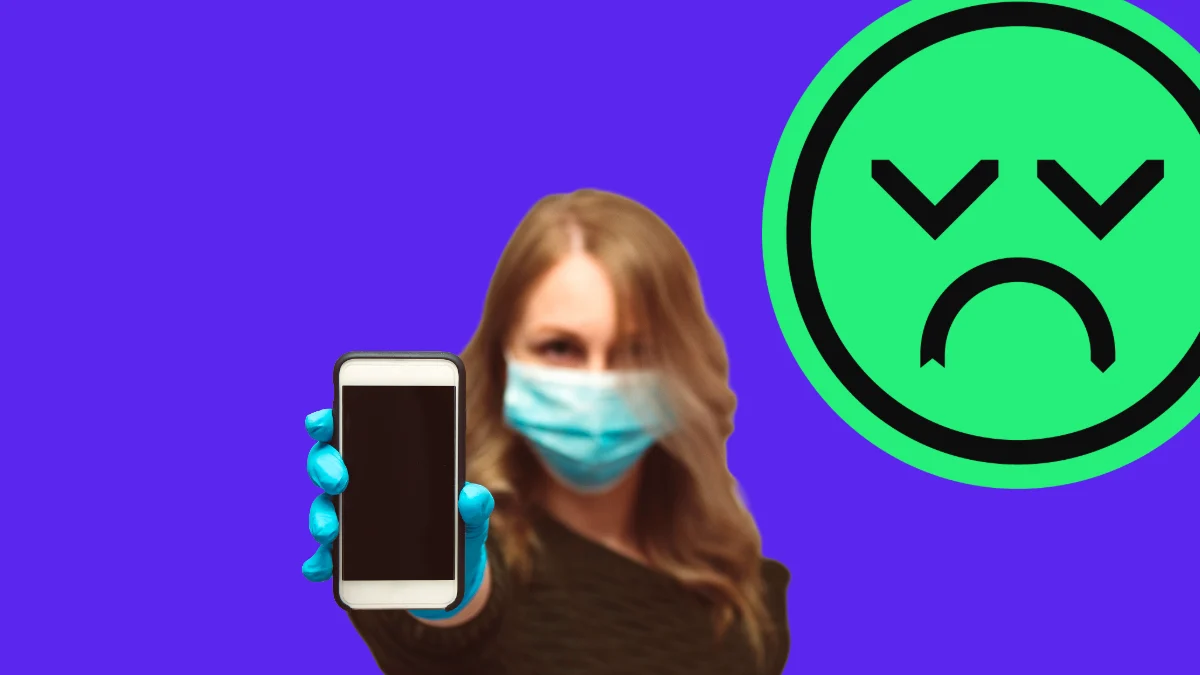 Image shows a woman in a face mask on a saturated purple background, holding an iPhone