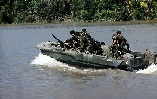Navy Seal in a boat in Vietnam 1967