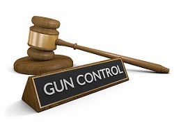 Gun control sign with law hammer