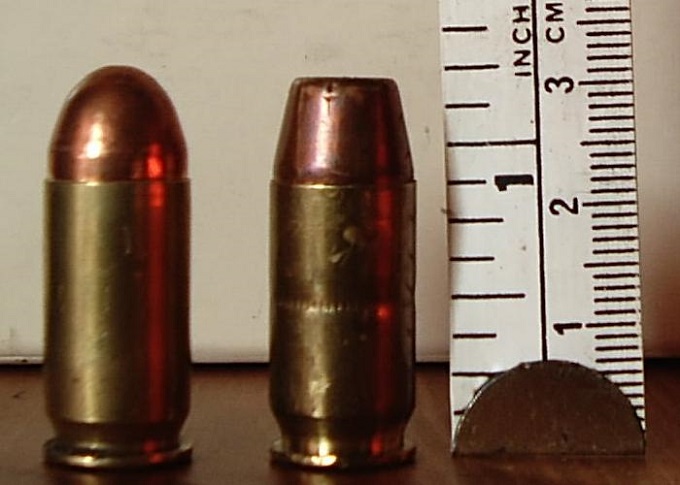 .45 caliber ACP ammunition. Left standard FMJ; right wadcutter.