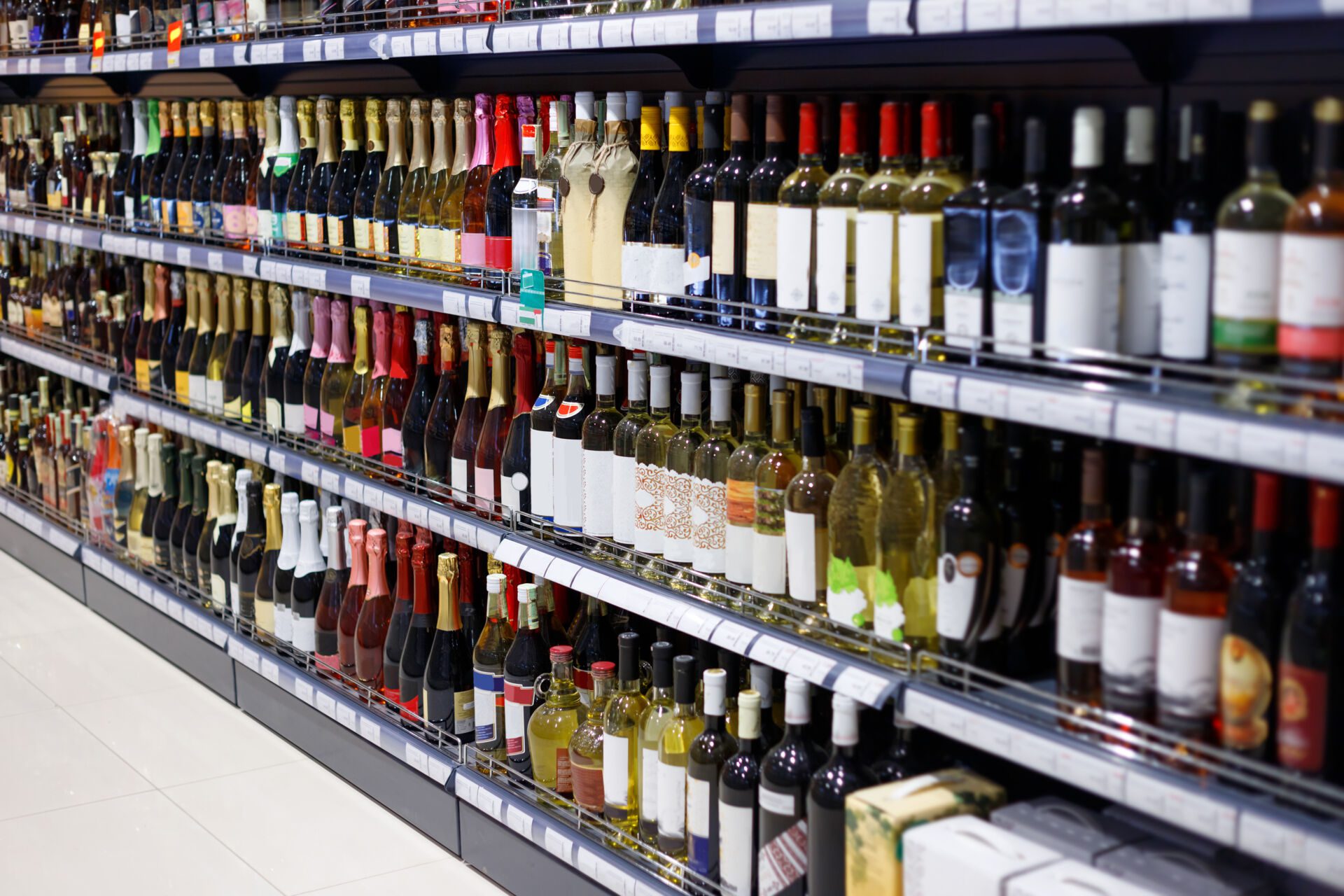 Shelves with variety of alcohol for sale in the supermarket Insurance for Beer, Liquor, and Wine Stores