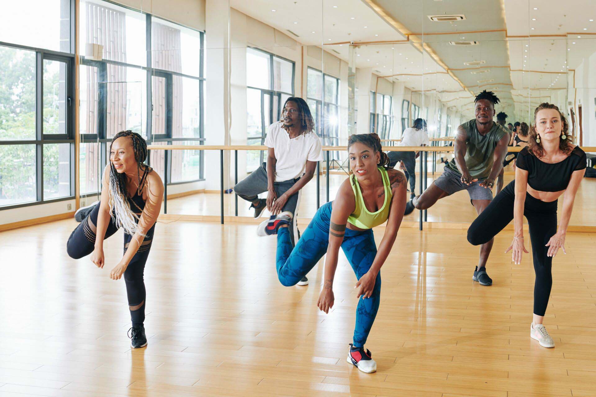 Dance coach showing new movement Insurance for Dance Instructors