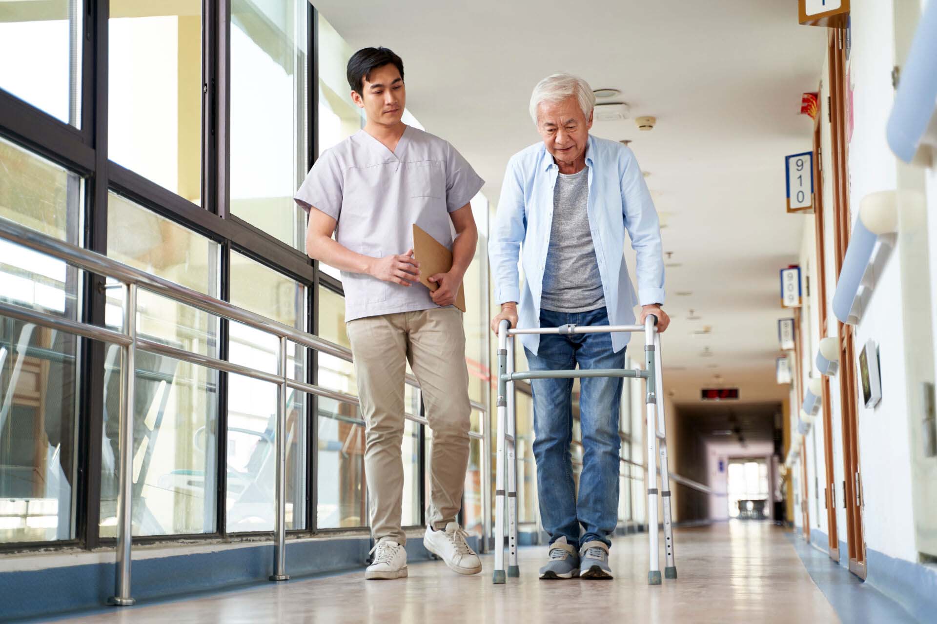 asian old man walking with a walker in rehab center Insurance for Occupational Therapists