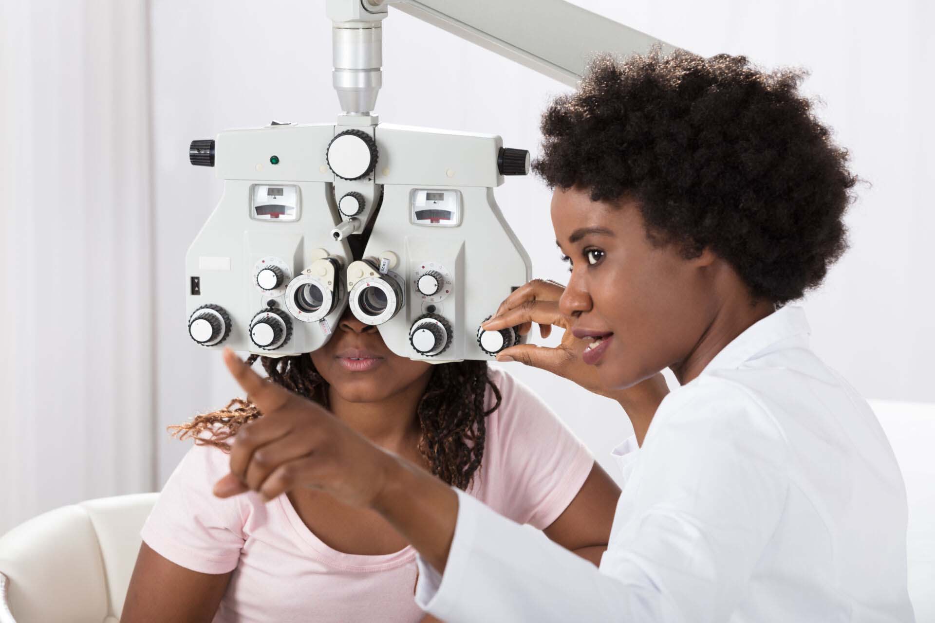 Optometrist Doing Sight Testing For Patient Insurance for Ophthalmologists