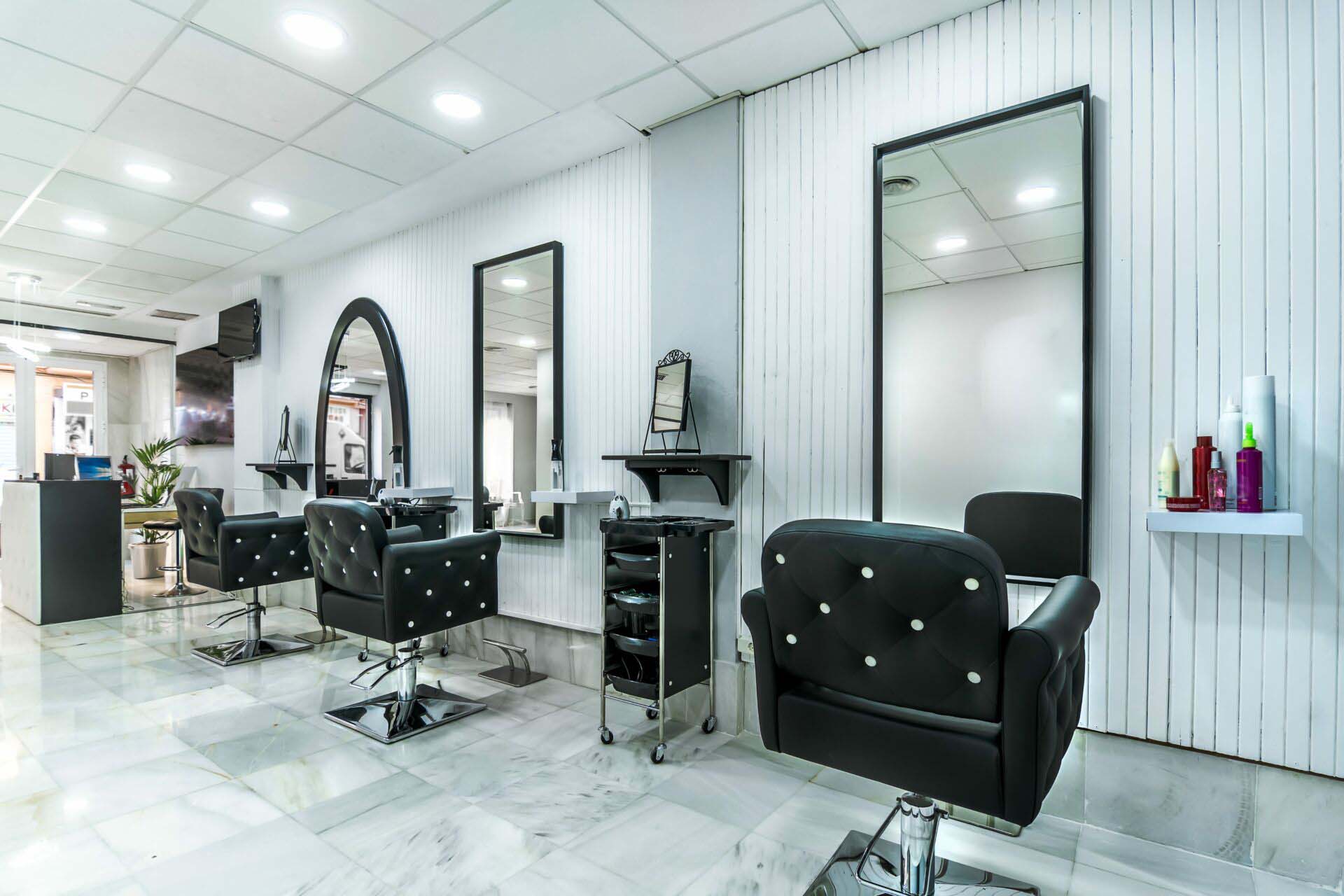 Modern bright beauty salon. Hair salon interior business Insurance for Hair and Beauty Salons