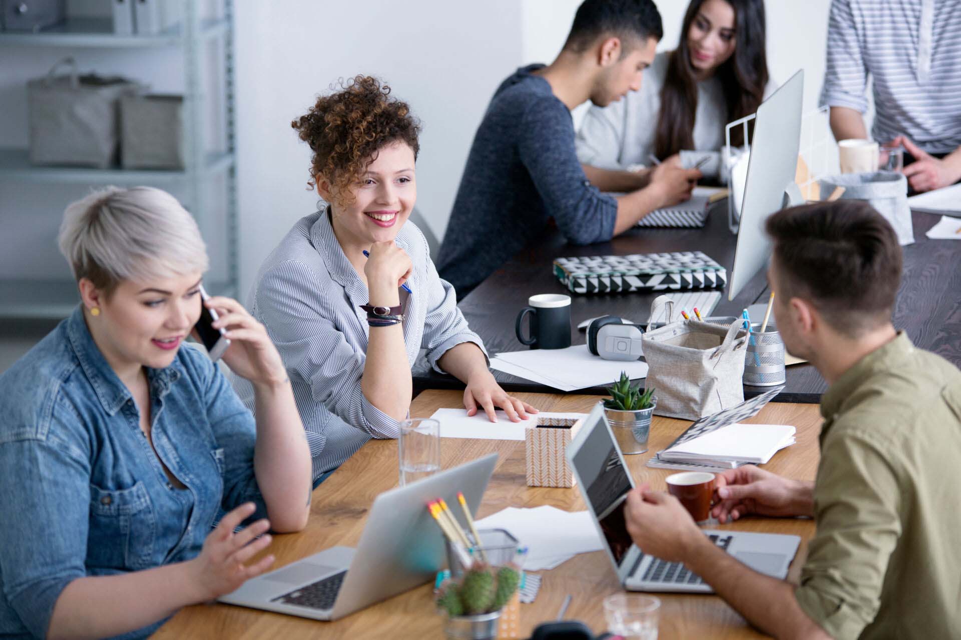 Businesswoman talking on the phone Insurance for Digital Marketing Agencies