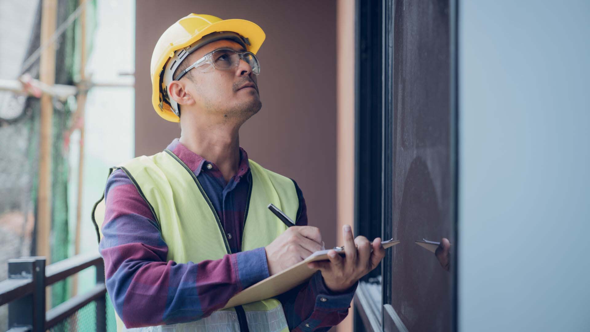 Construction concept , Foreman officer inspector defect about en Insurance for Building Inspectors