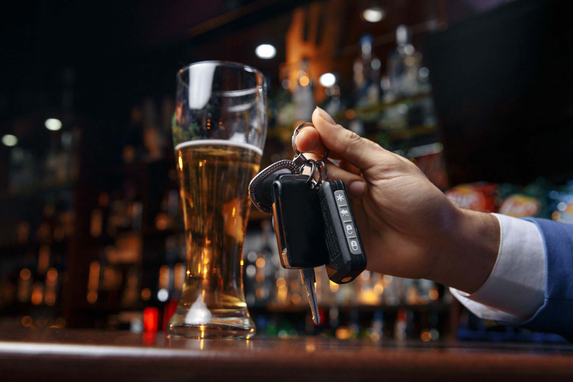 Do not drink and drive Cropped image of drunk man talking car Liquor Liability Insurance