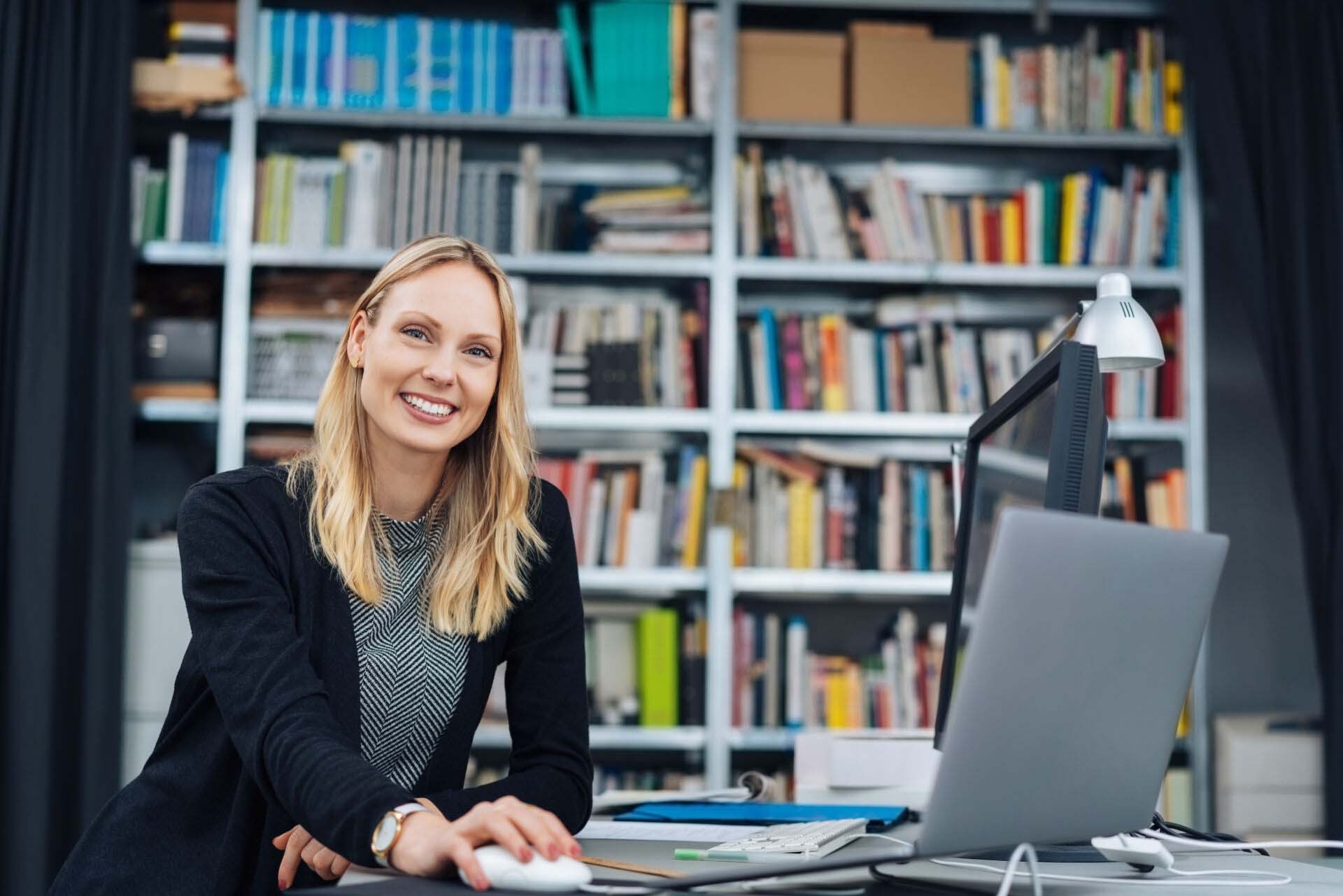 Beautiful business woman low angle portrait Insurance for Publishers