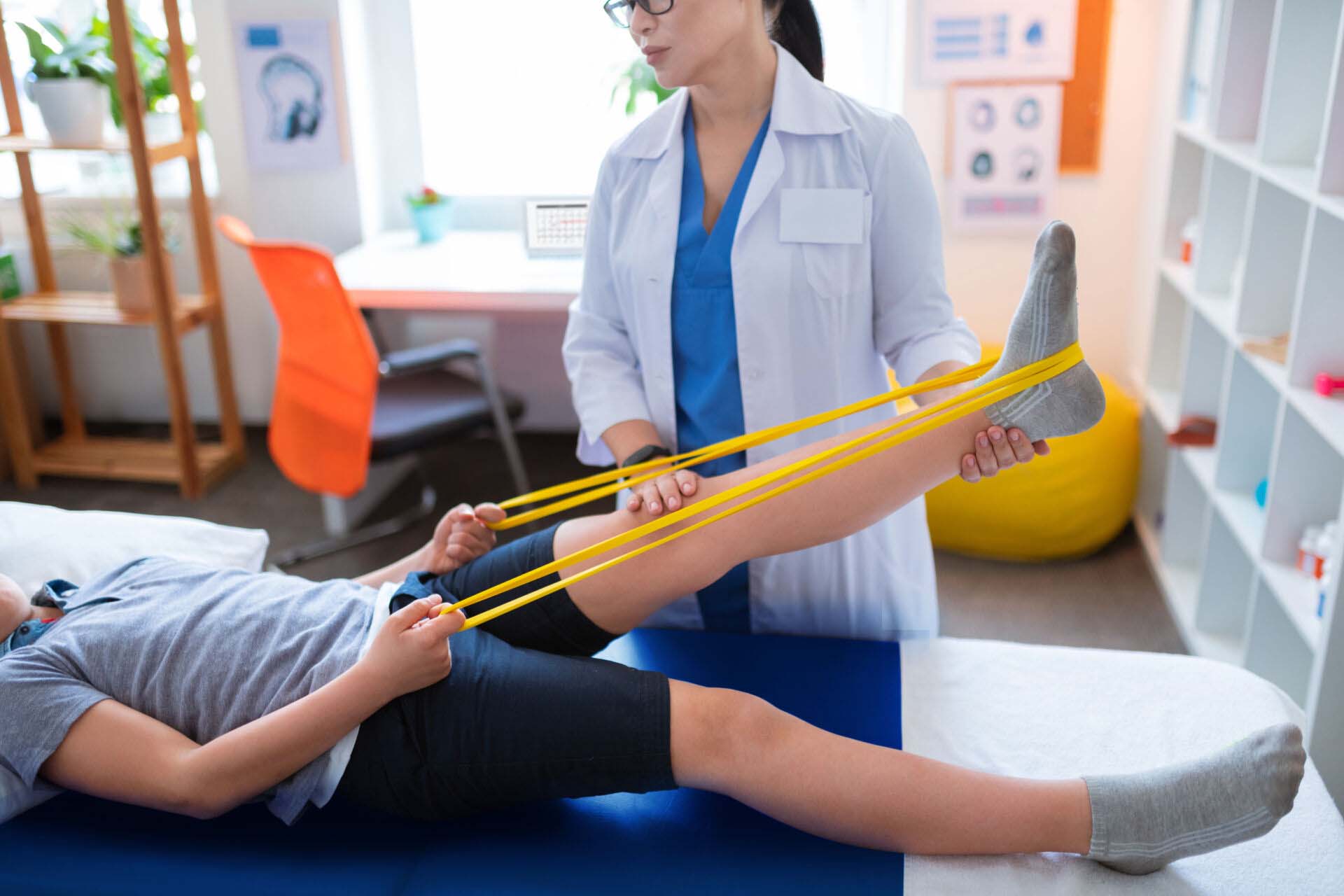 Hard-working little patient going through rehabilitation process Insurance for Physical Therapists