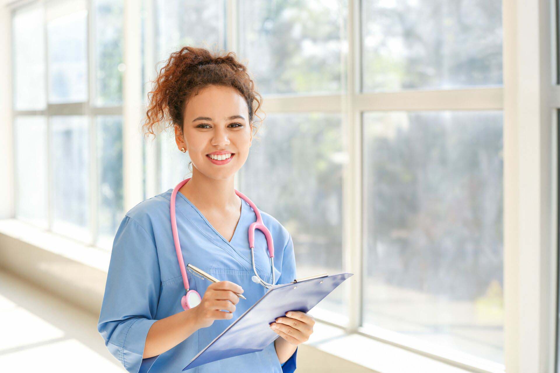 Young African-American nurse in clinic Insurance for Nurses