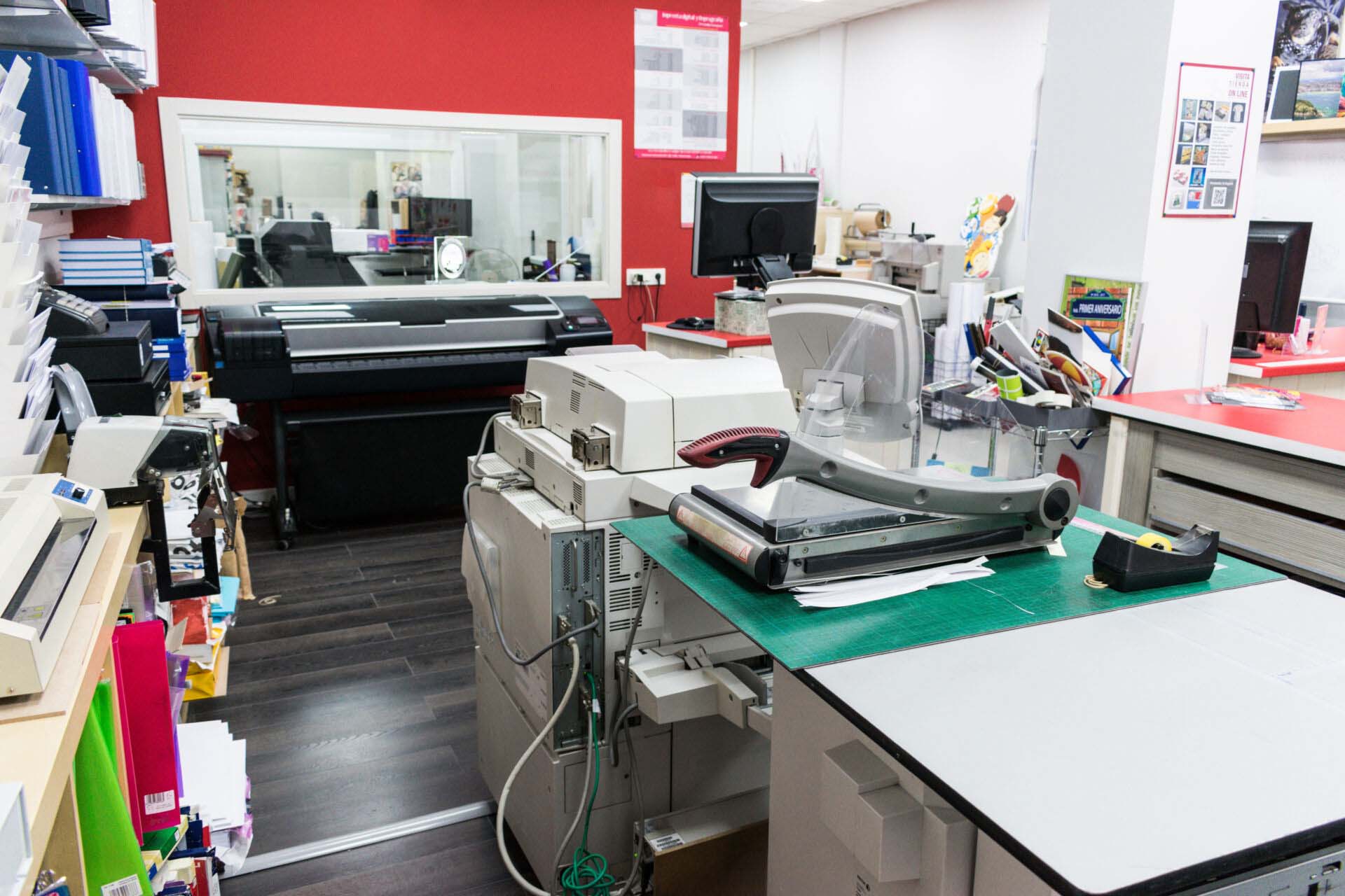 View of photocopy shop with work machines Insurance for Print Shops