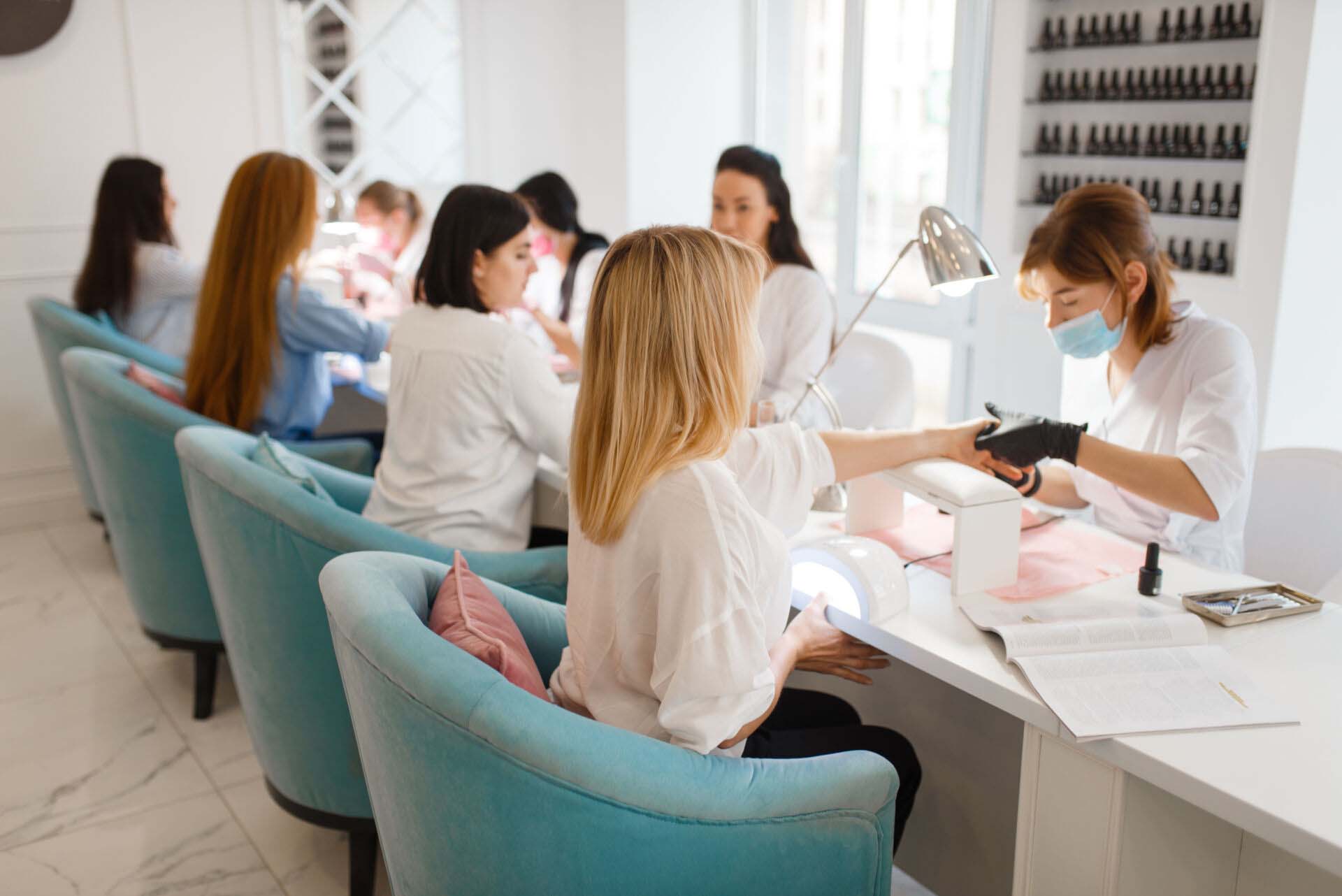 Group of girlfriends, manicure in beauty salon Insurance for Nail Salons