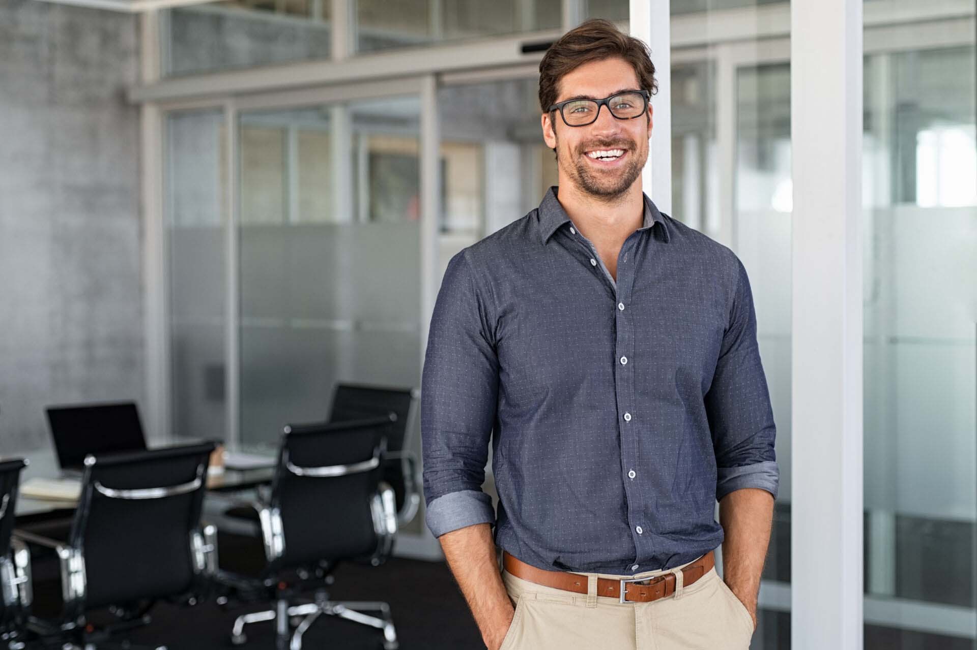 Success businessman smiling in office States