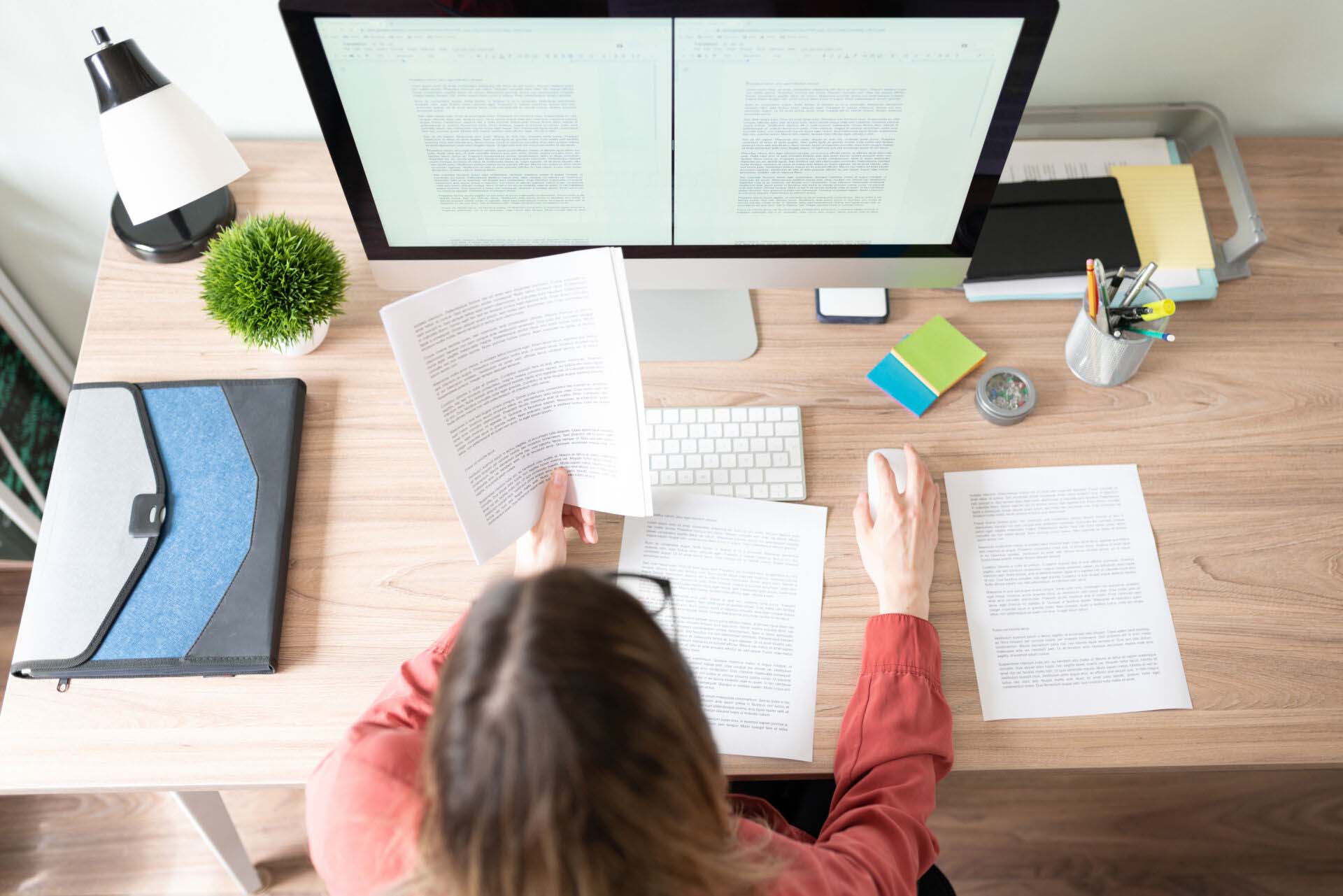 Female translator working on a document Insurance for Writers and Authors