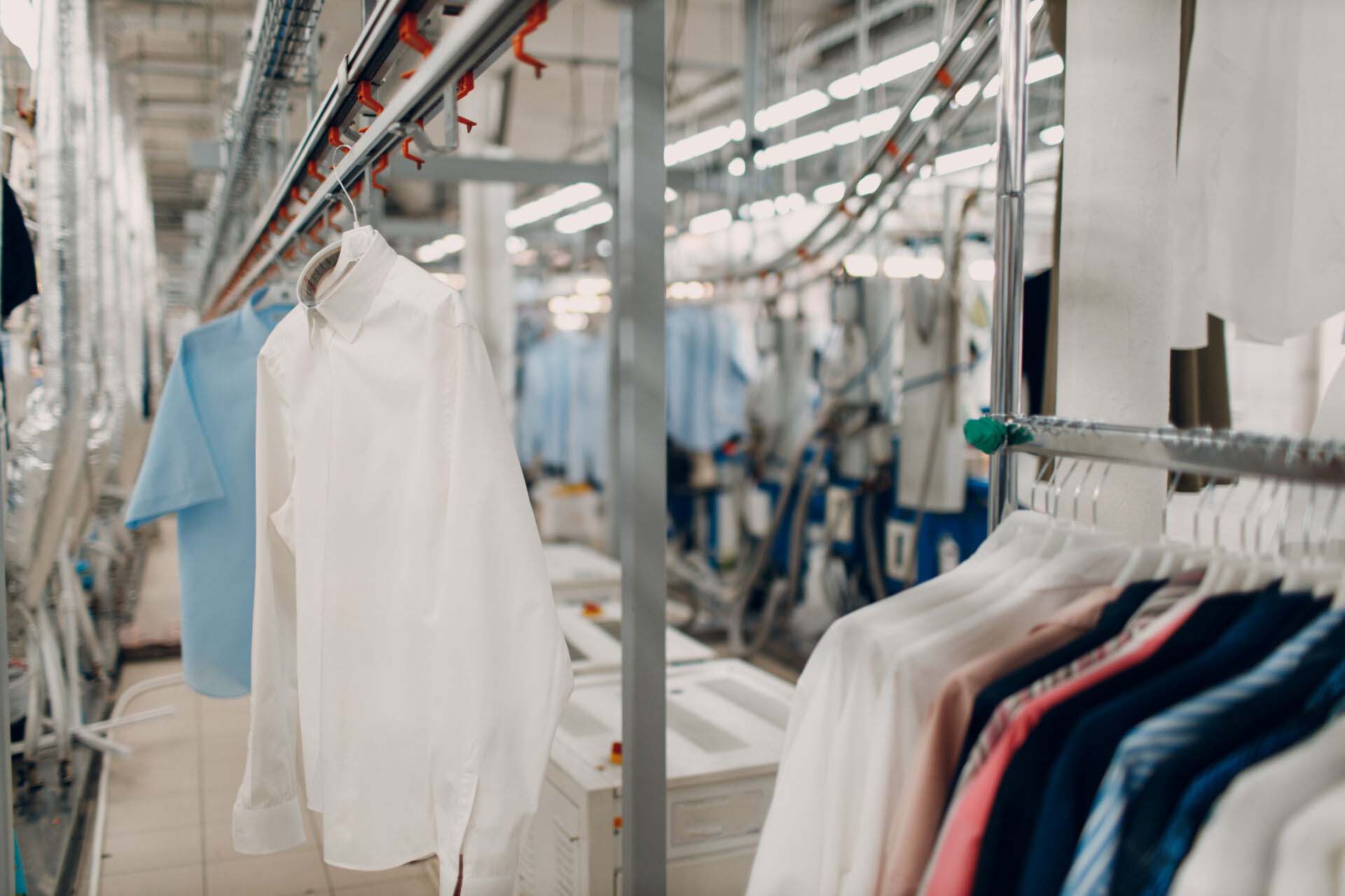 Dry cleaning clothes. Clean cloth chemical process. Laundry industrial dry-cleaning Insurance for Dry Cleaners and Tailors