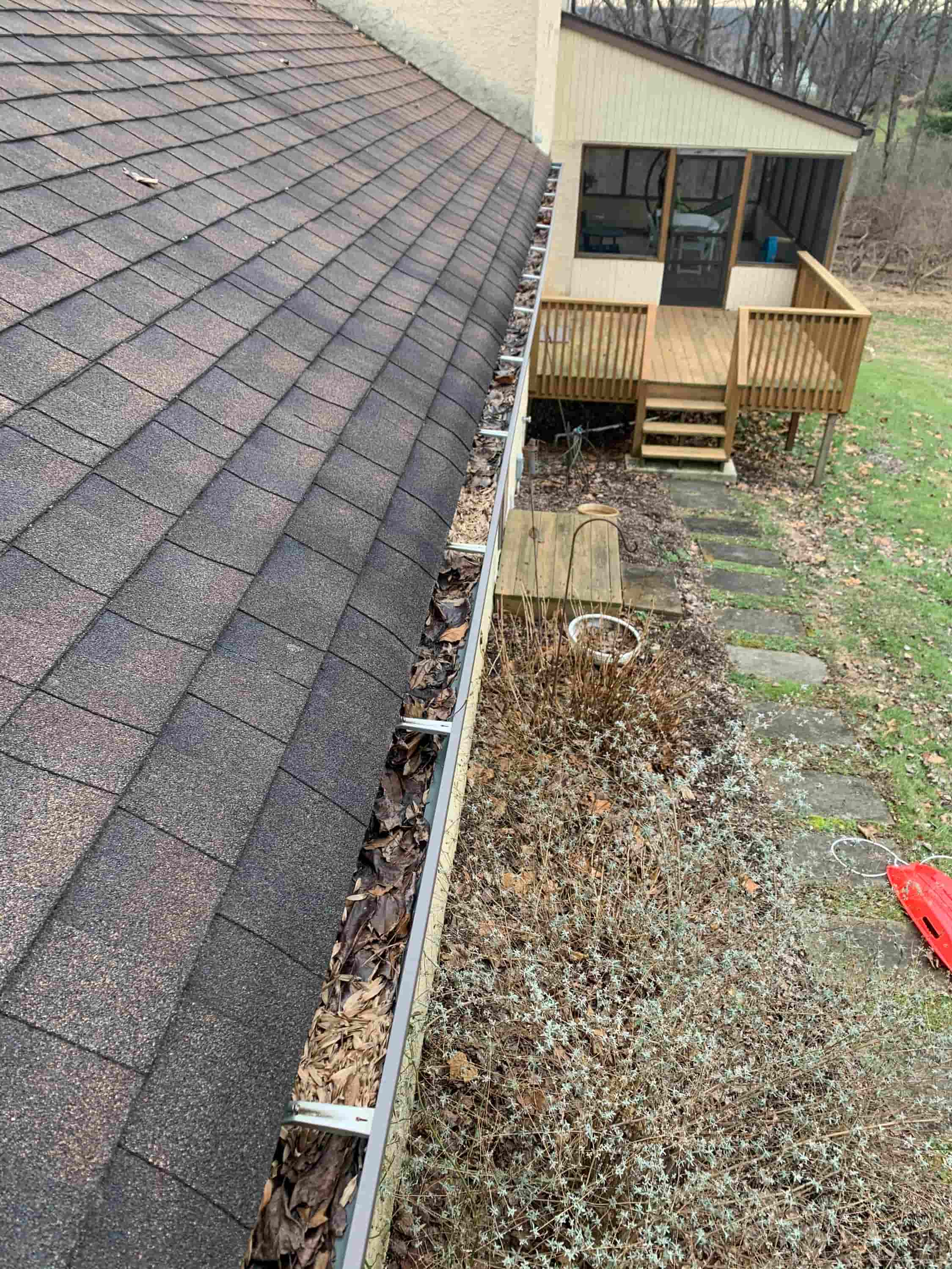 cleaning gutters from the roof