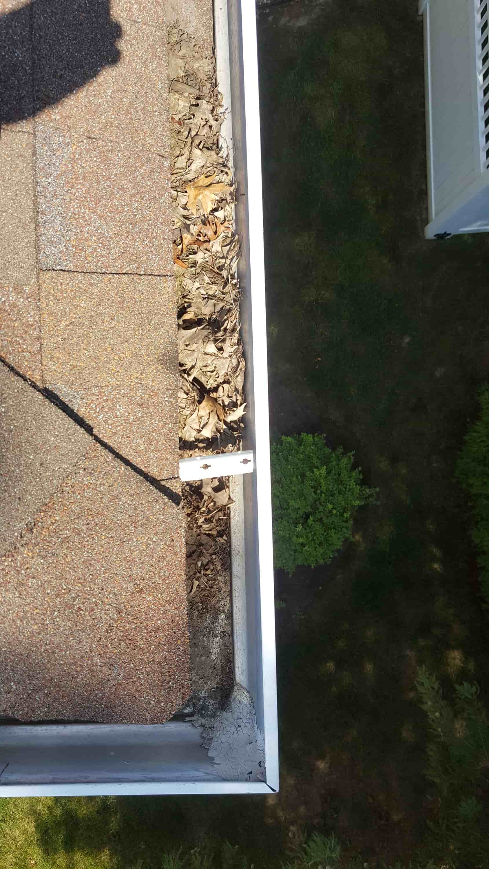 how to clean clogged gutter downspout