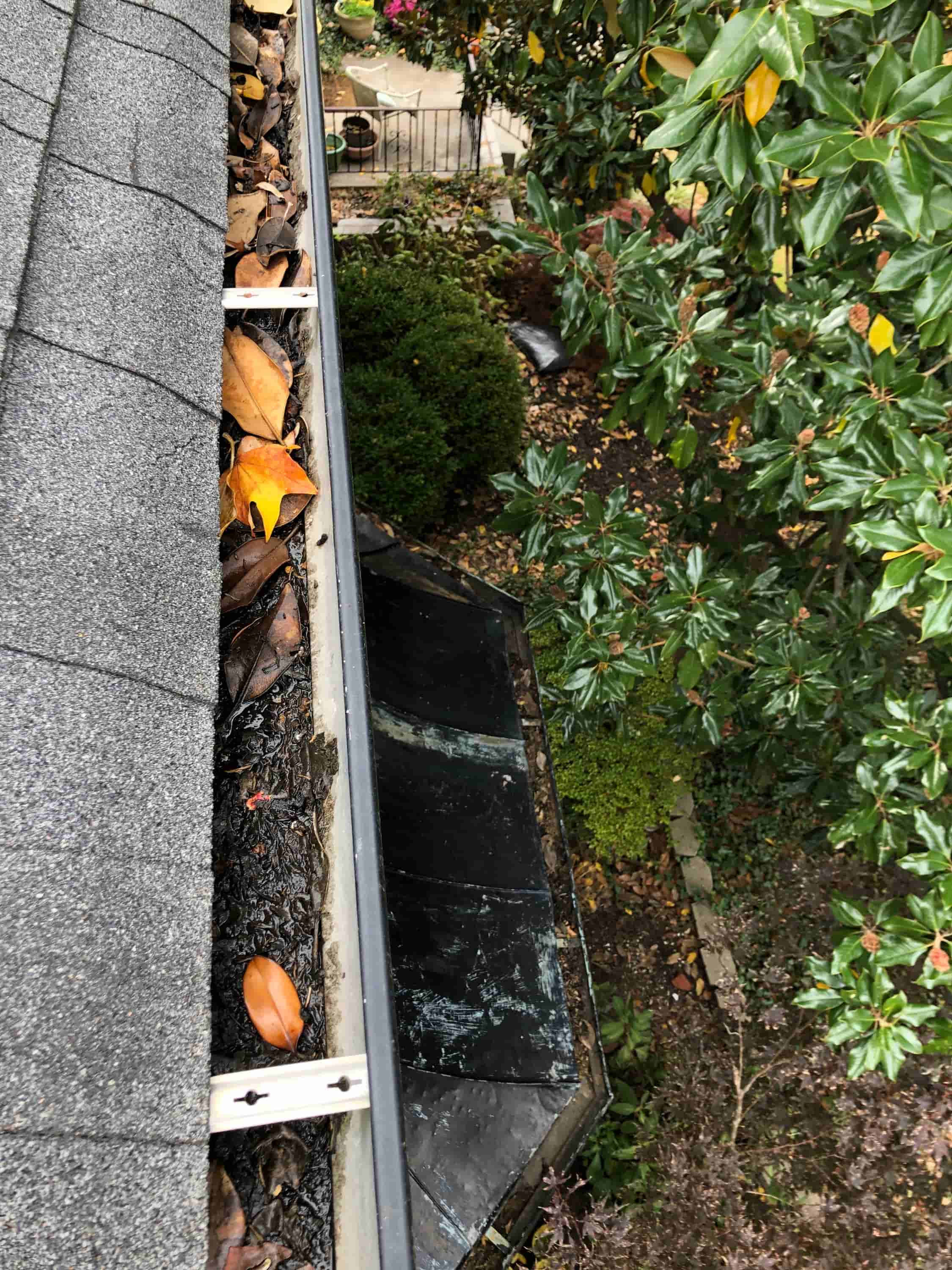 cleaning out downspouts