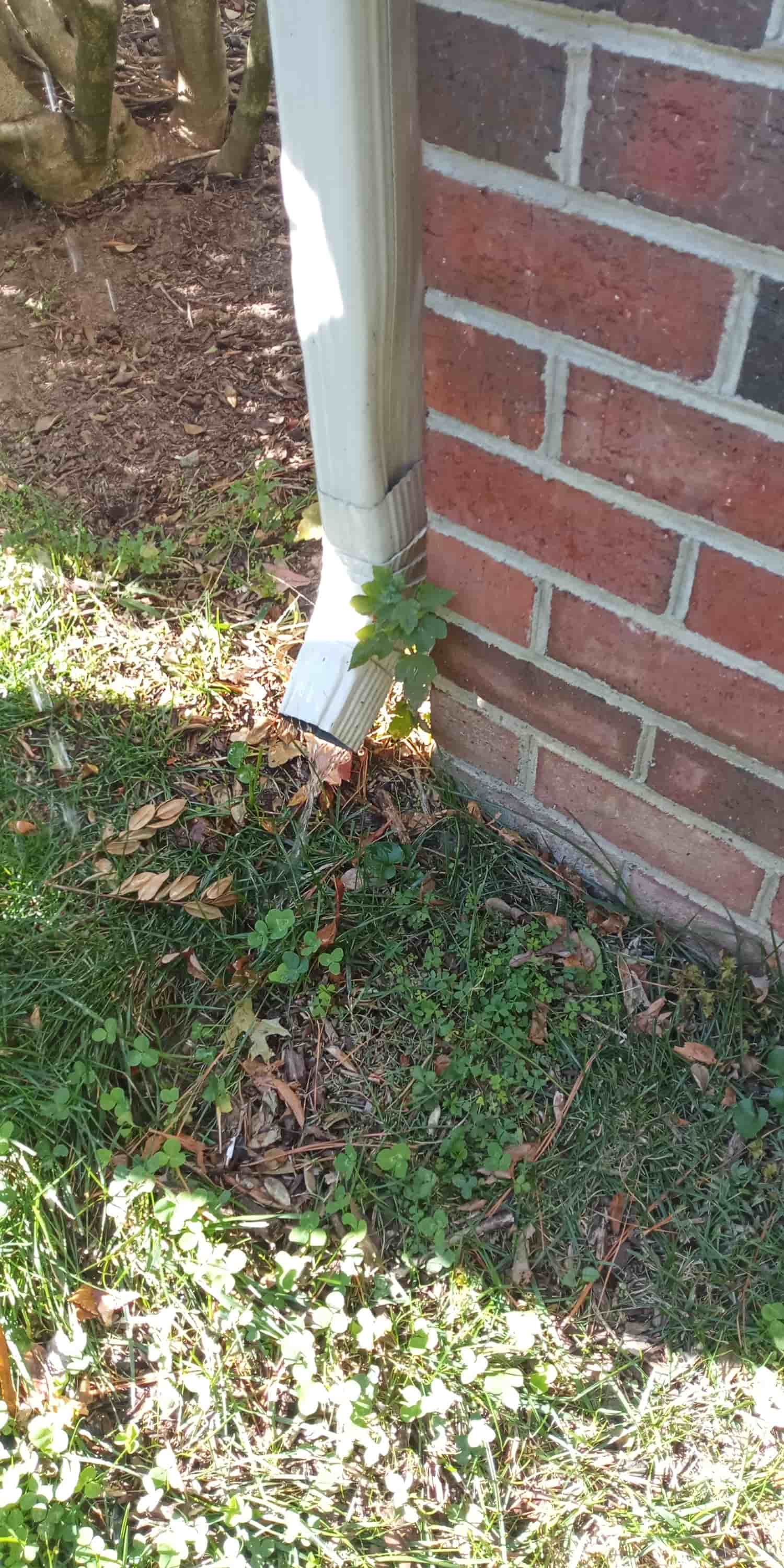 how to clean out gutter downspouts