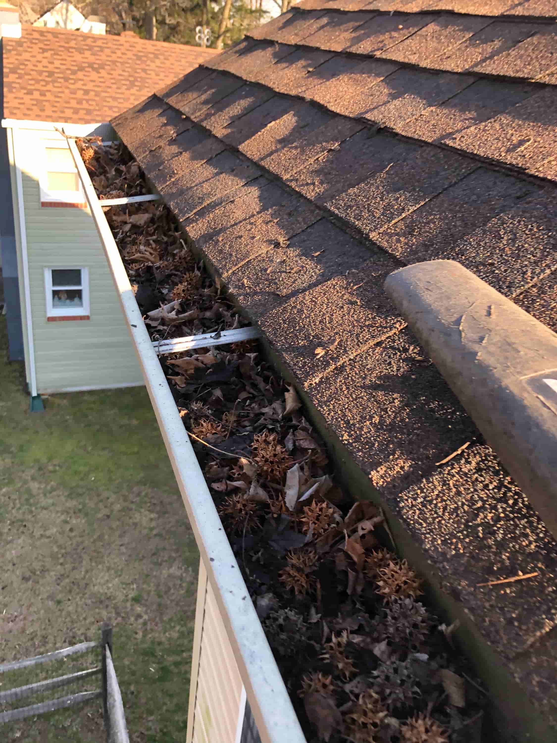 how to unclog gutter downspout