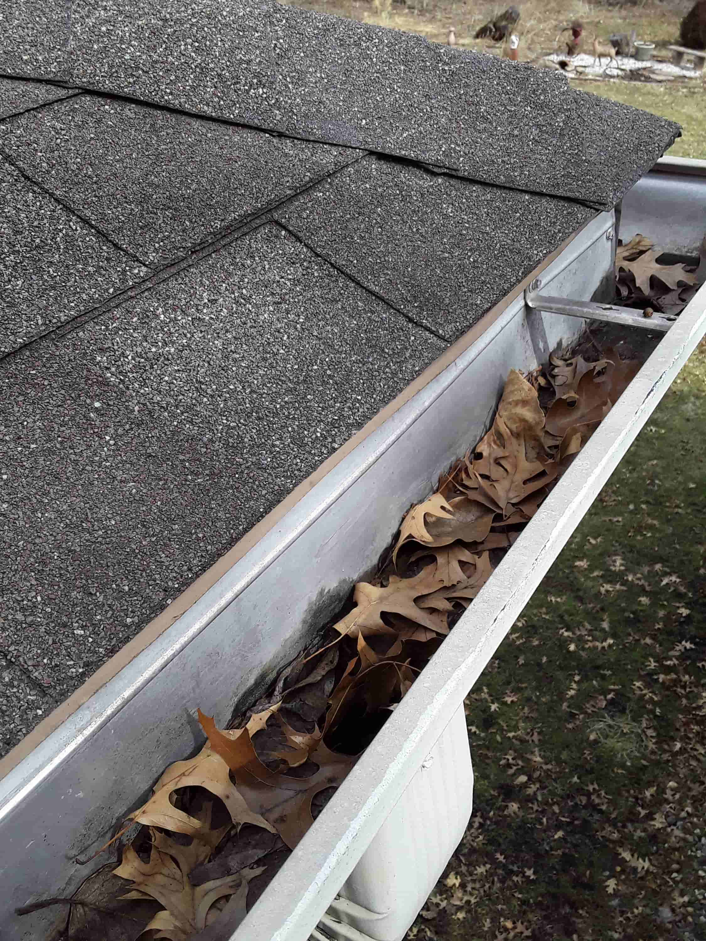 easiest way to clean gutters