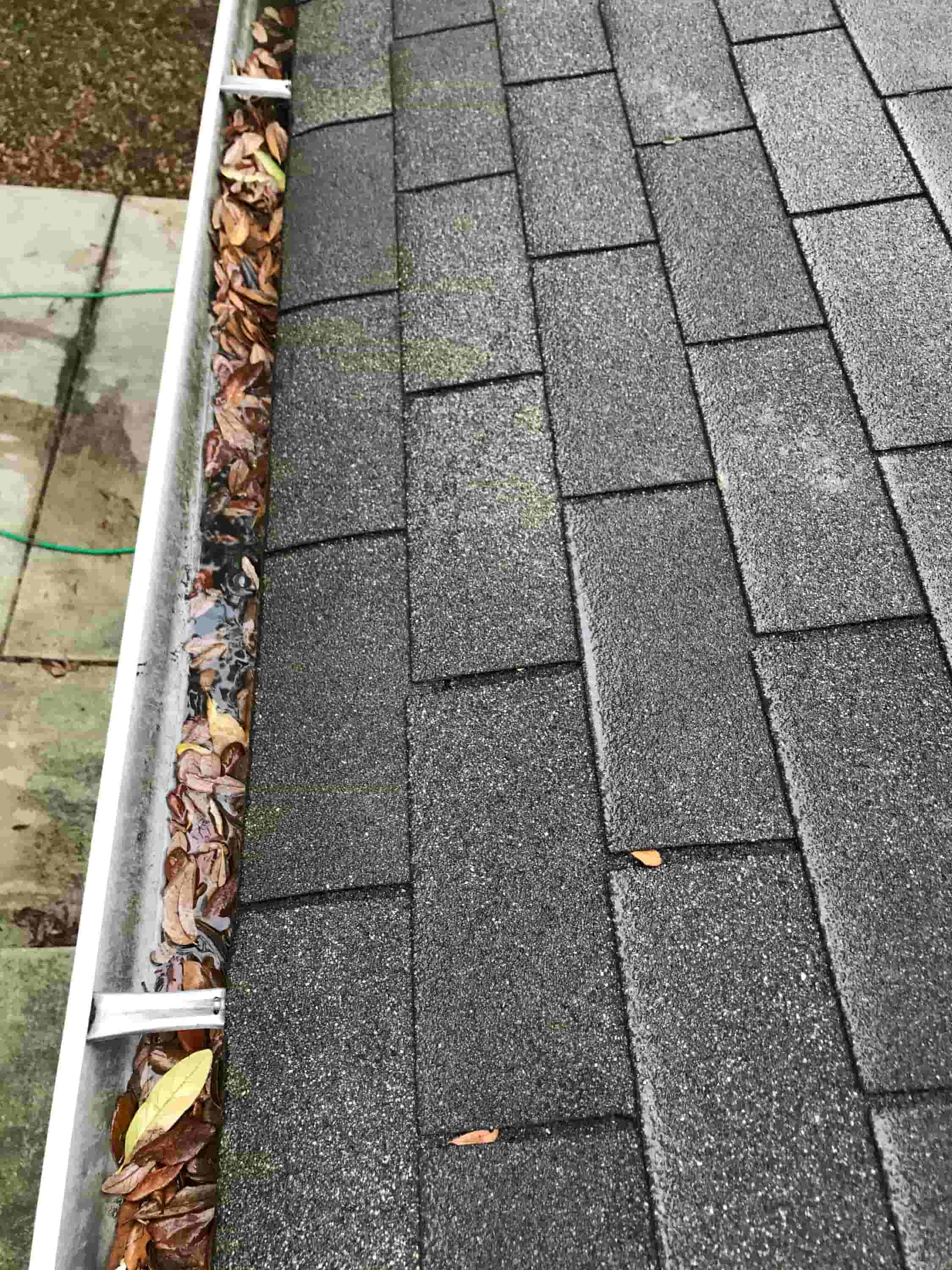 unclog gutter downspouts