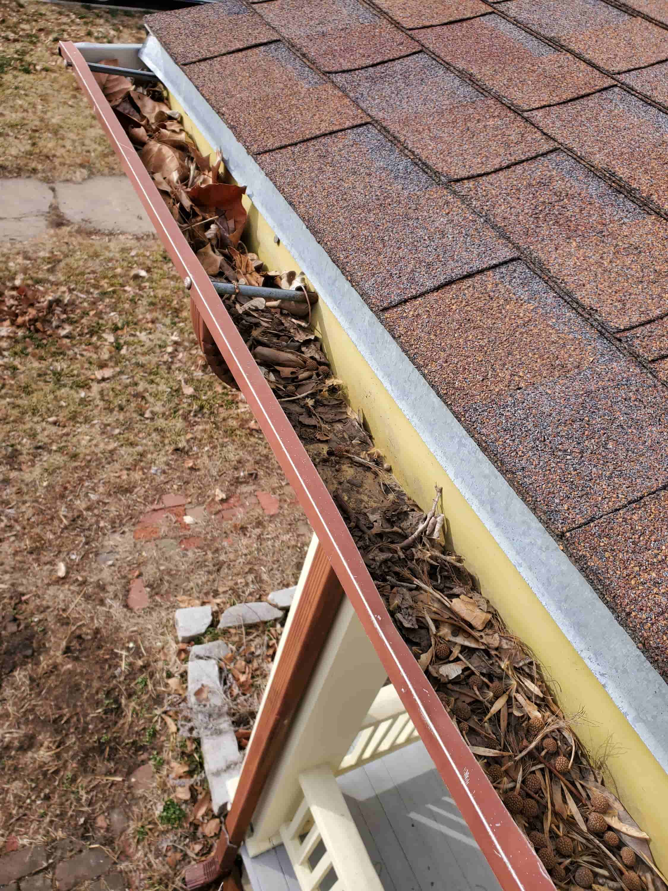 when to clean gutters