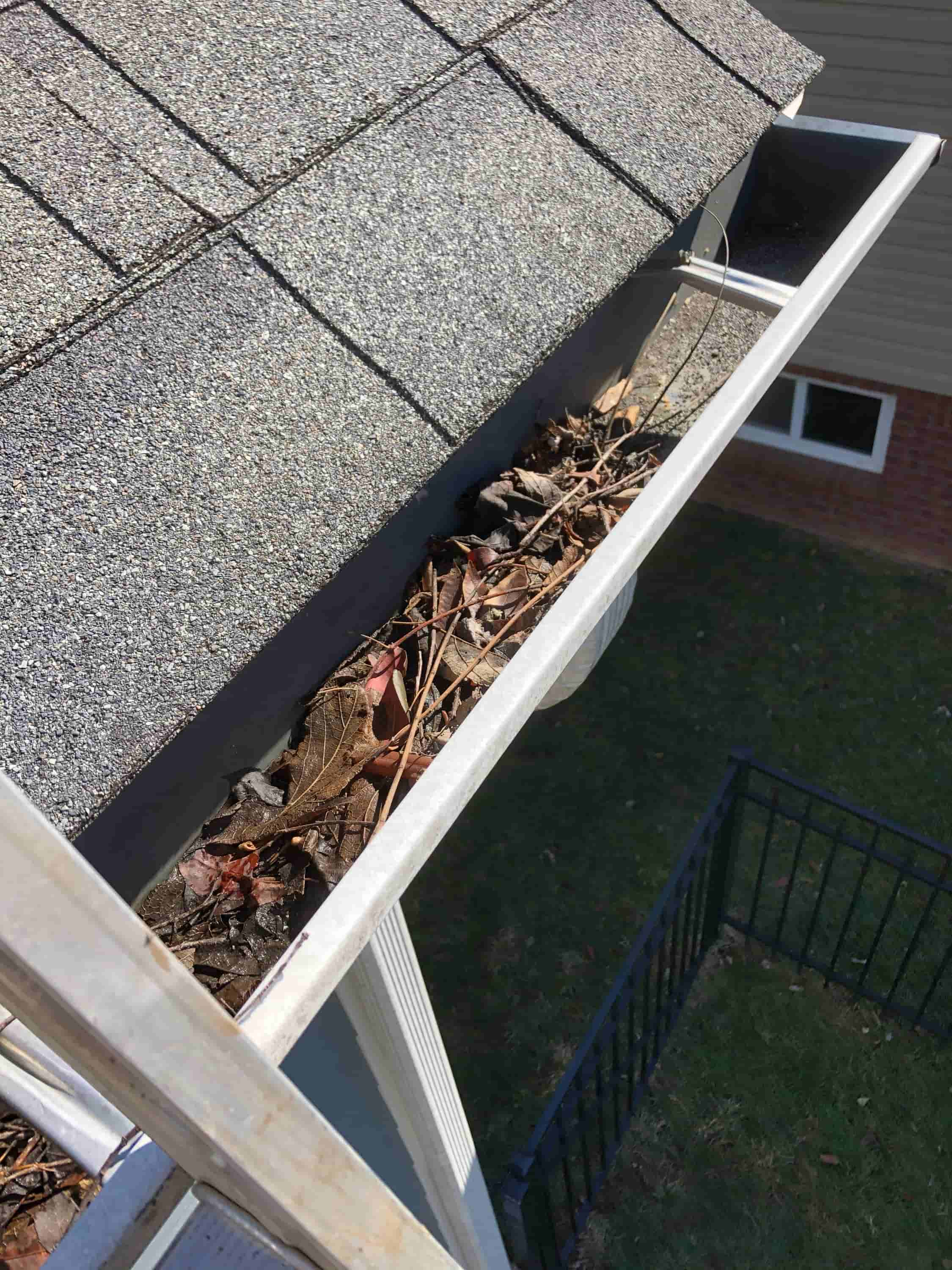 gutter cleaning with pressure washer