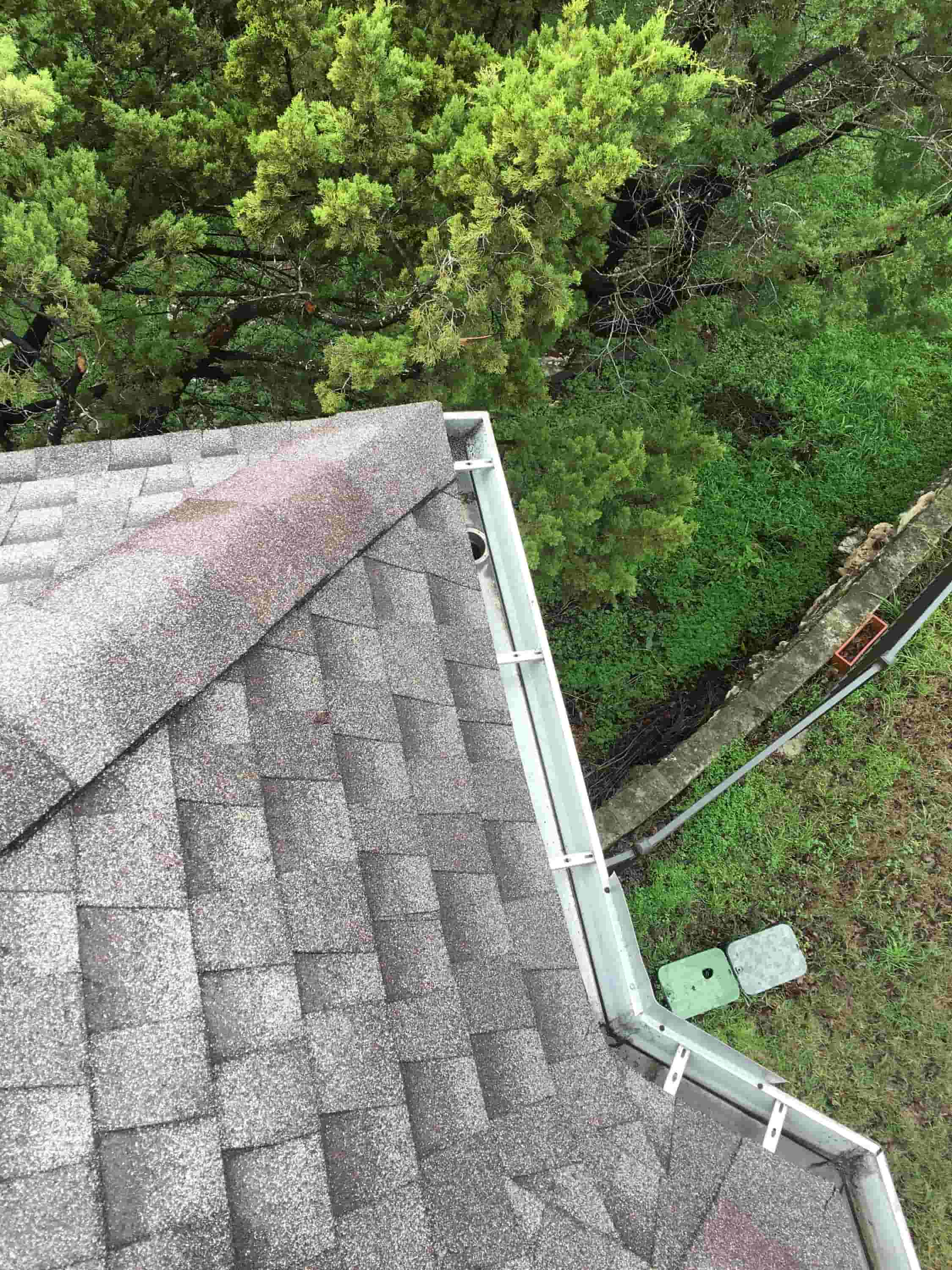 cleaning gutter downspouts