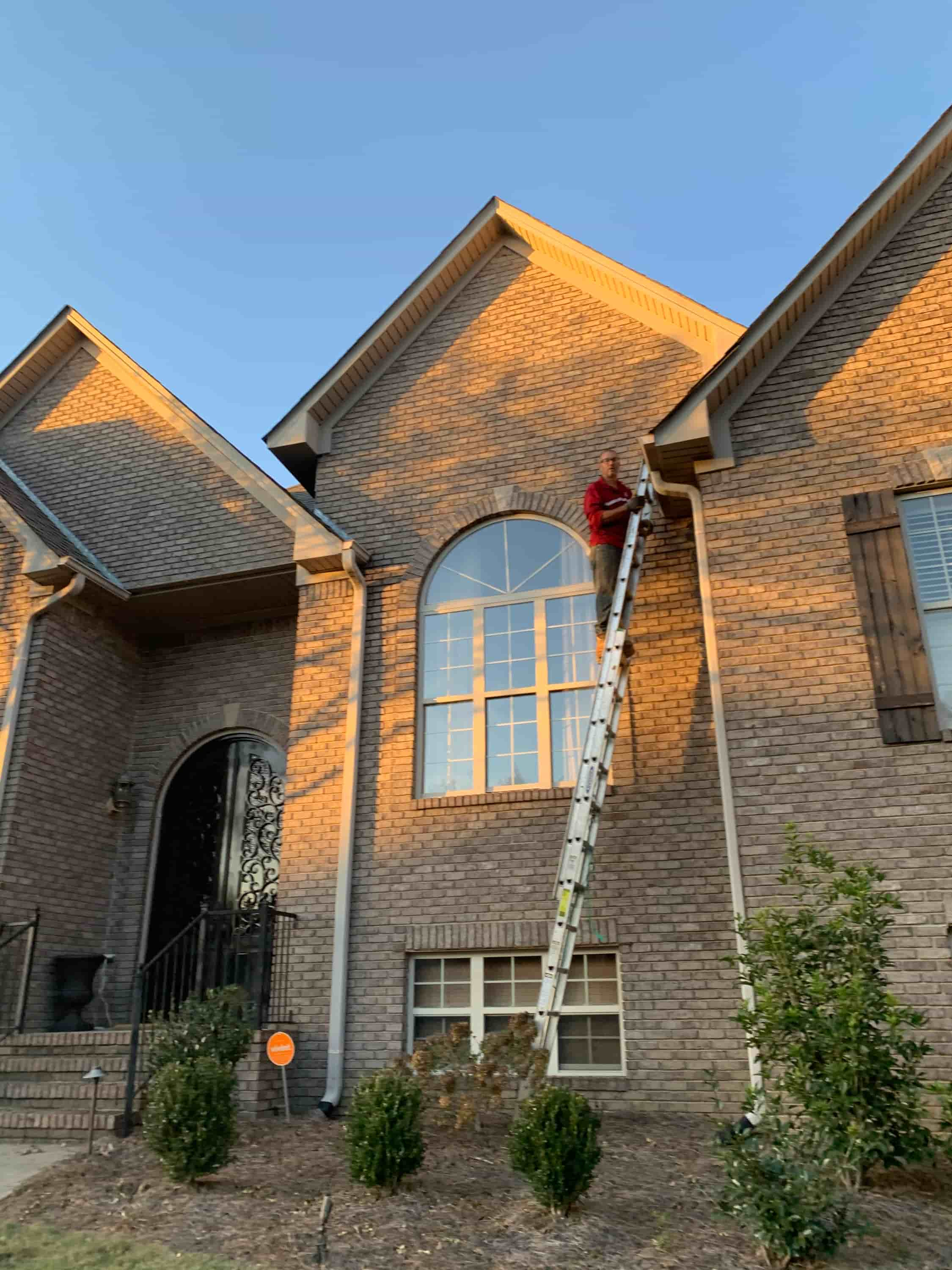 cleaning gutters above conservatory