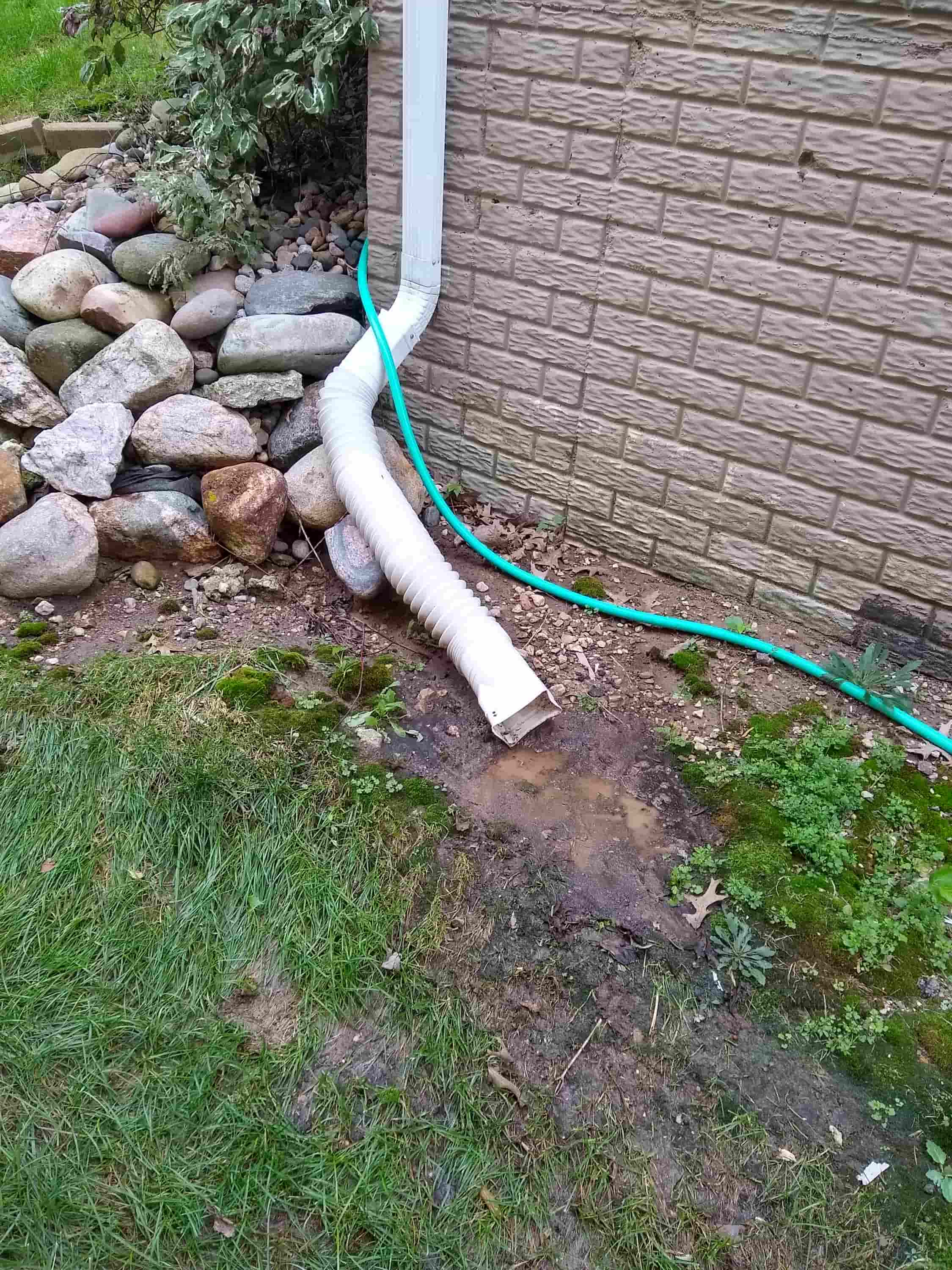 how to unclog gutter downspout