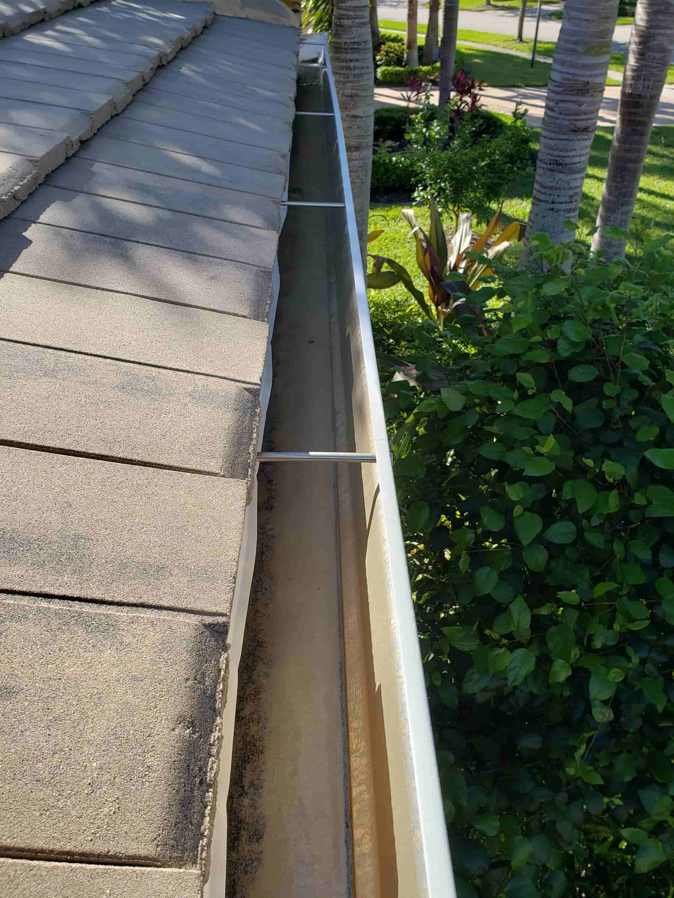 how to clean out gutter downspouts