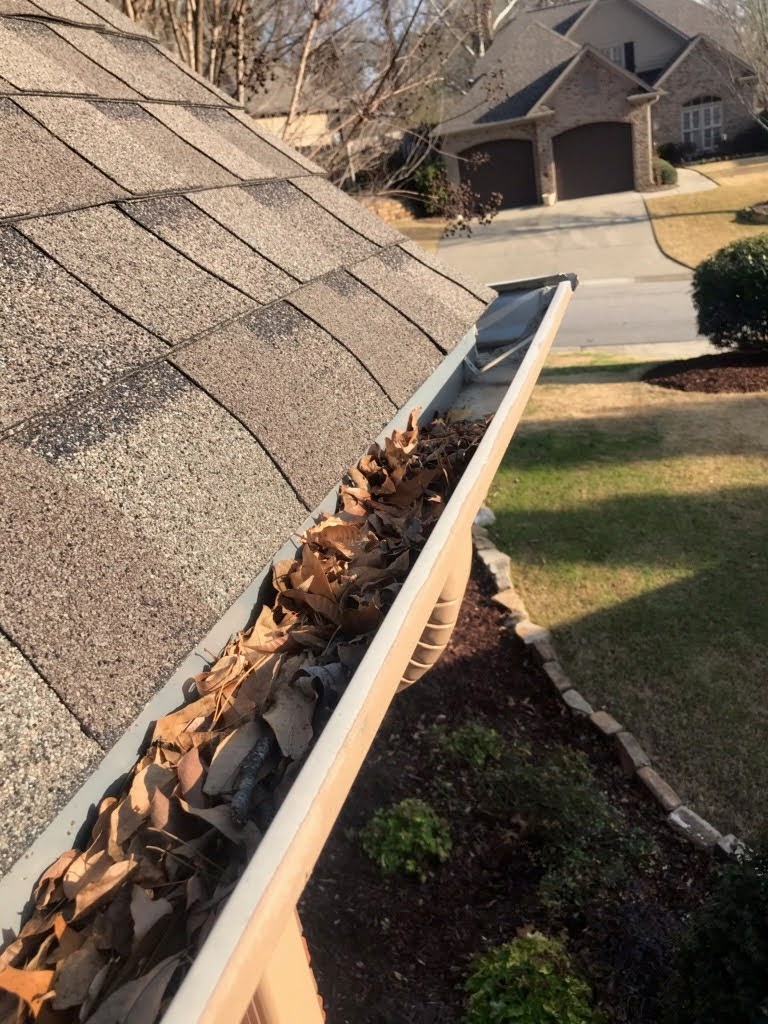 how to clean gutters without a ladder