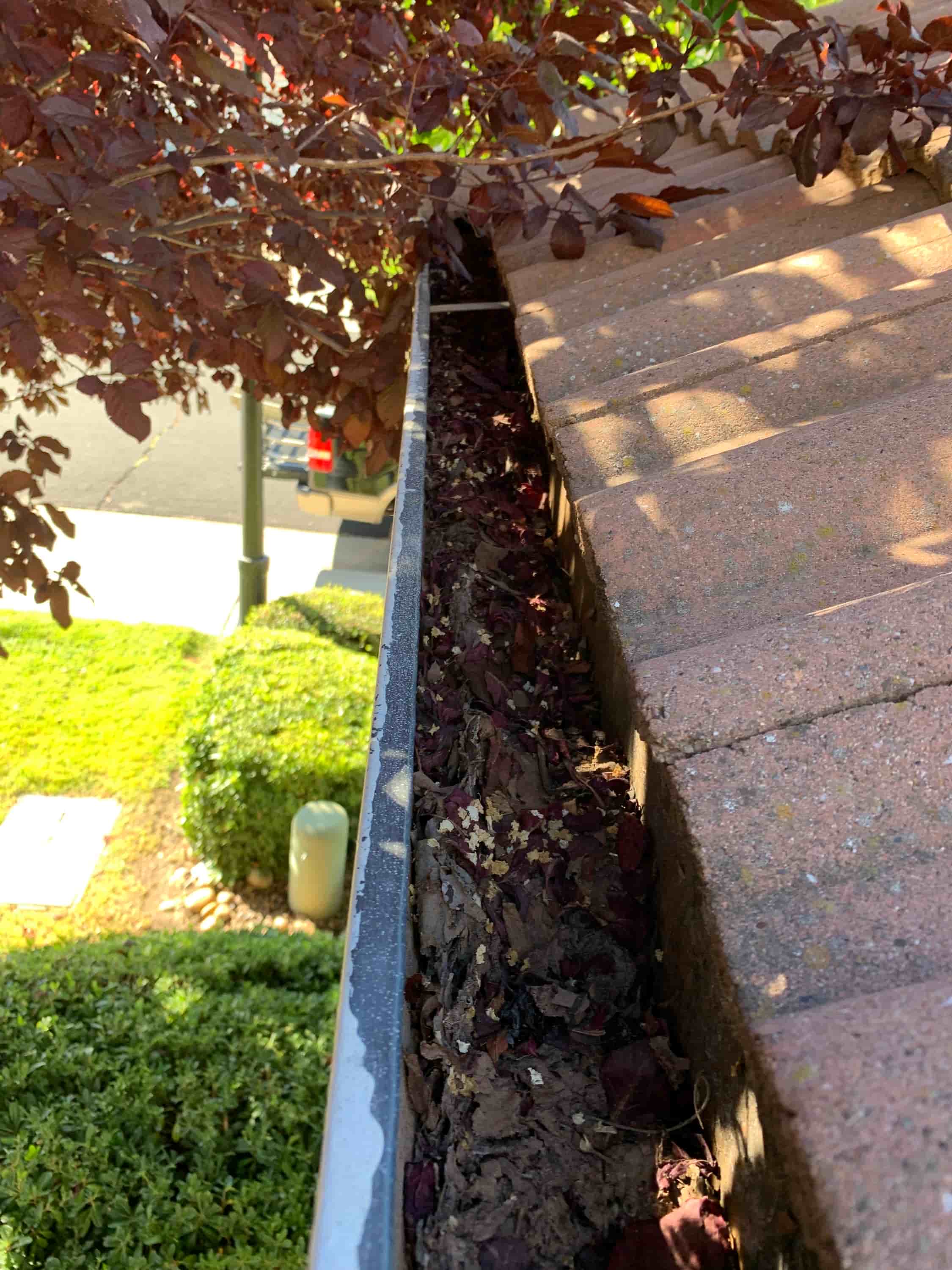 how to clean gutters high up