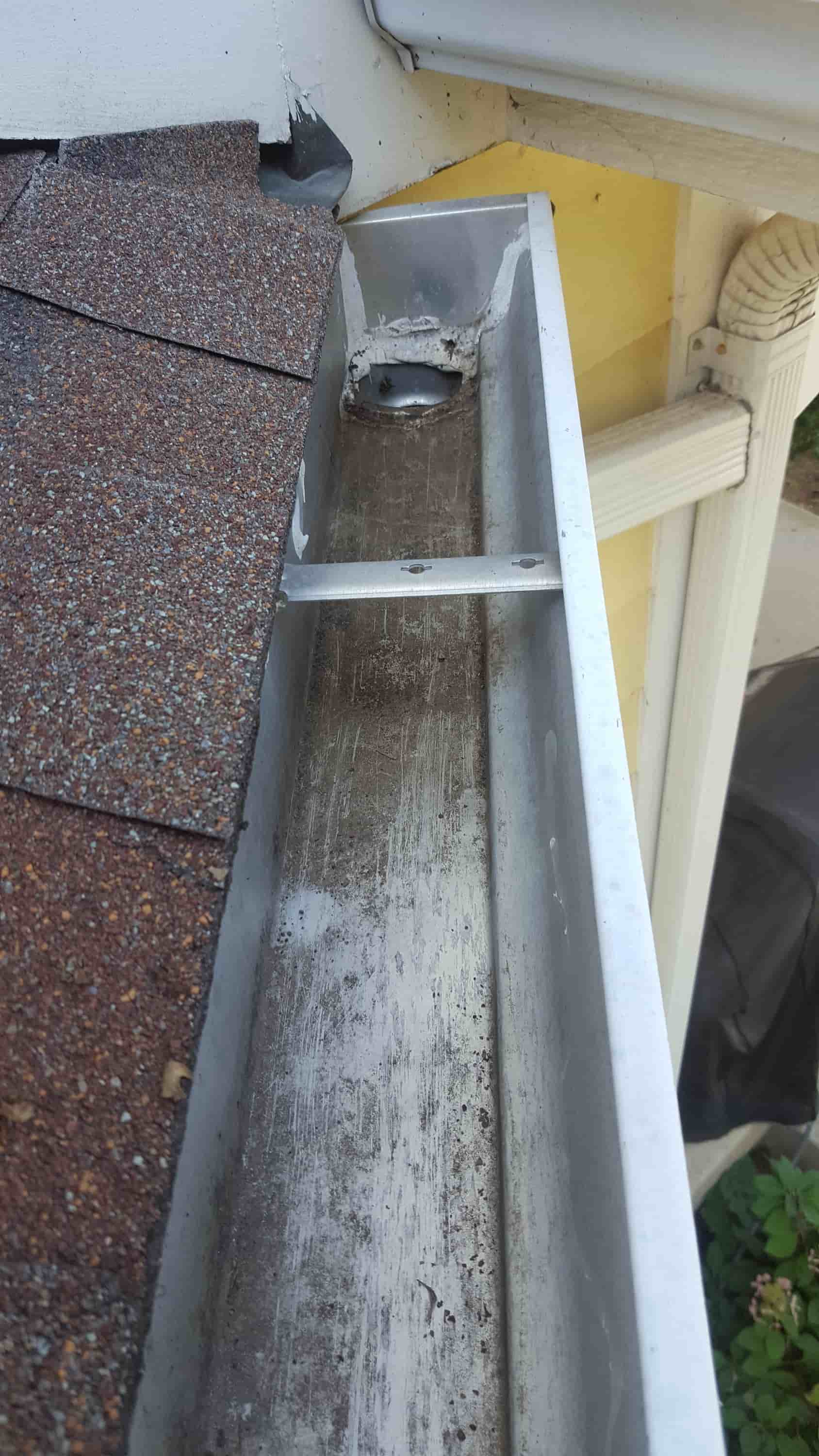 cleaning white upvc guttering