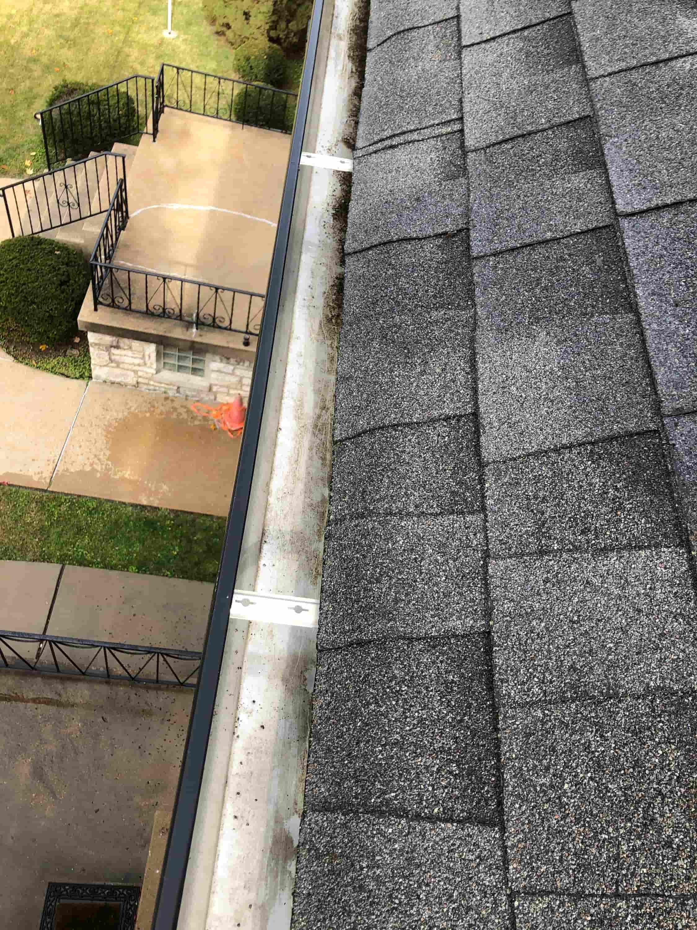 cleaning white upvc guttering
