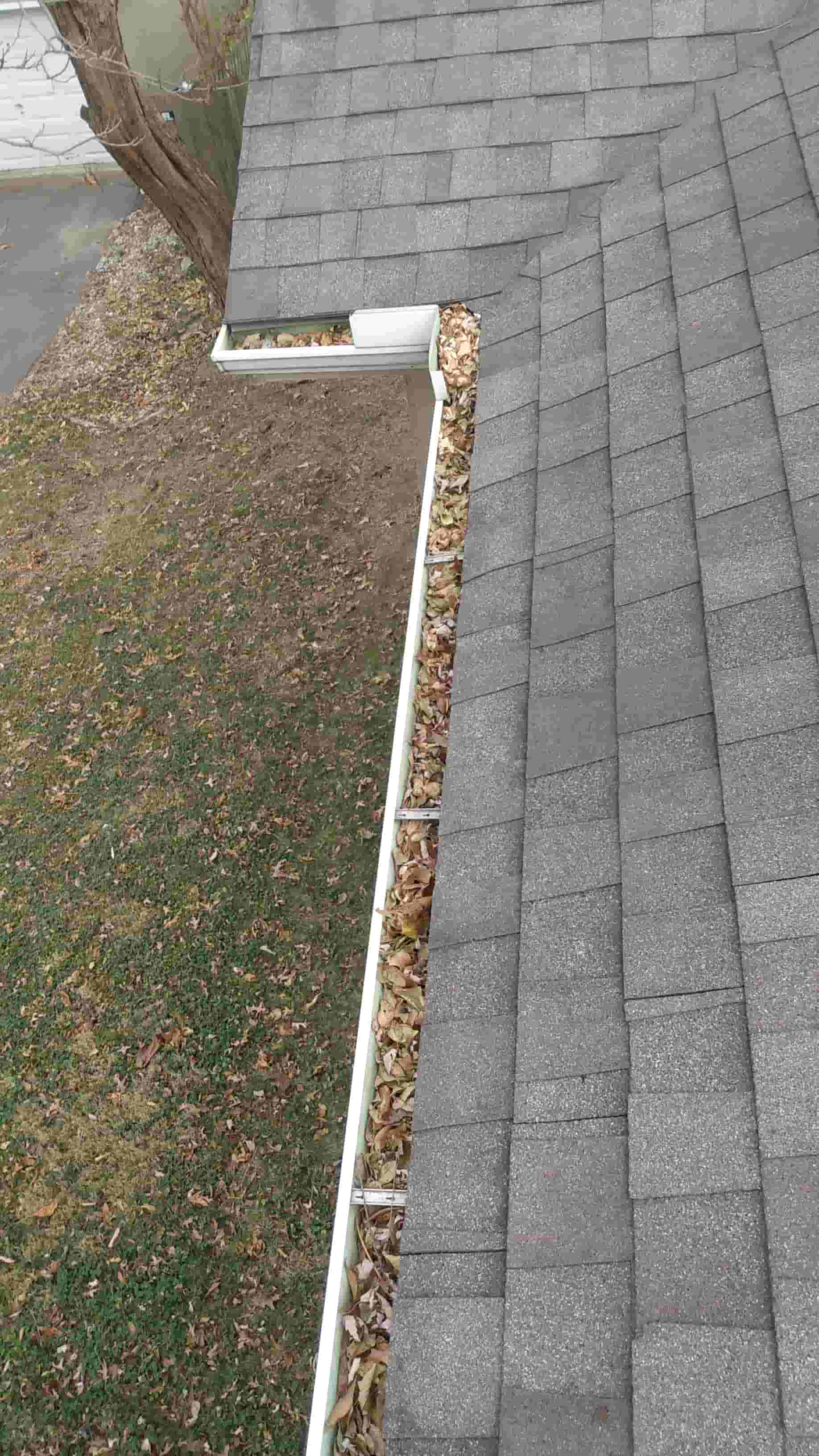 cleaning gutters from the roof