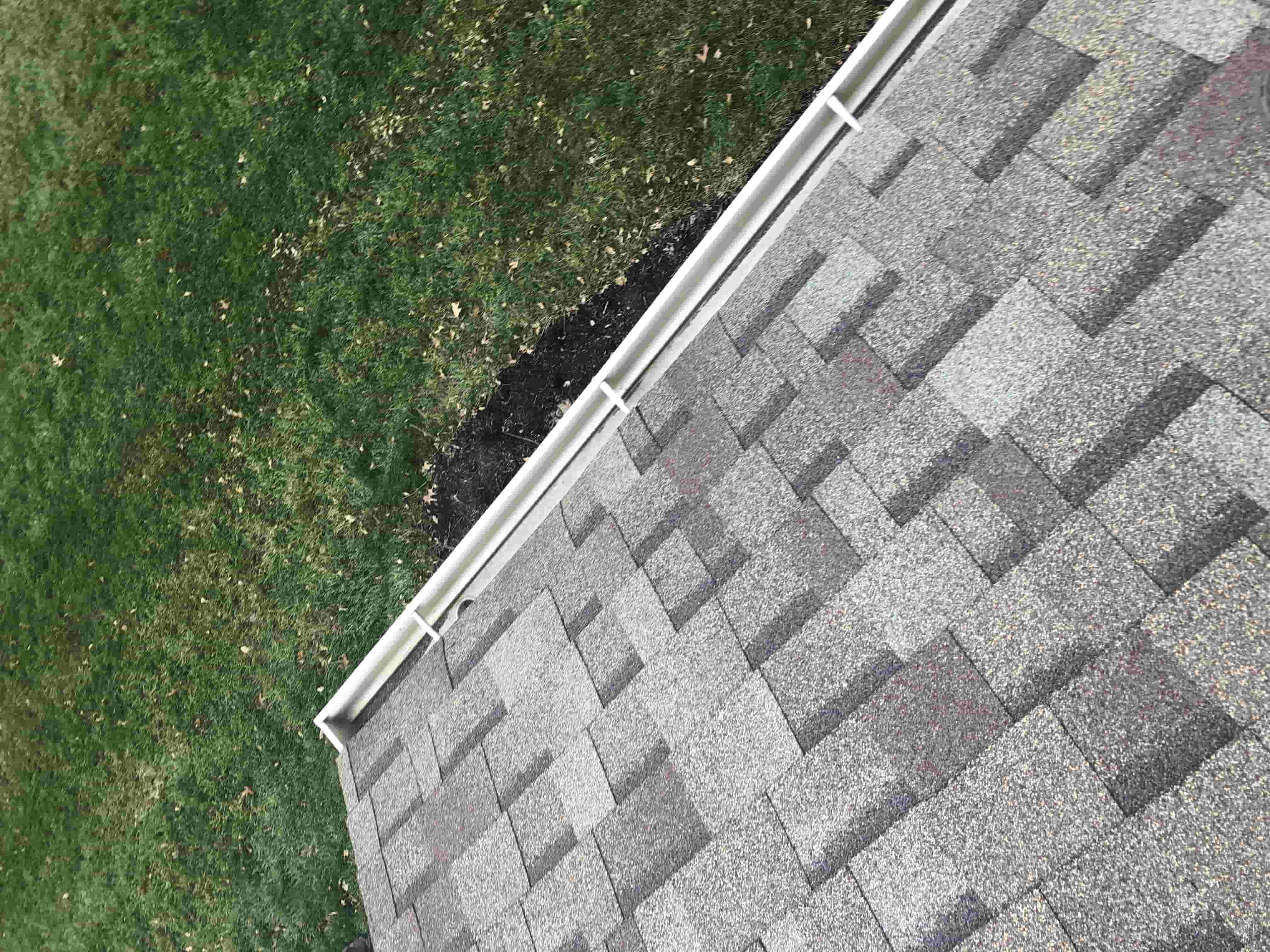 clean gutters with gutter guards