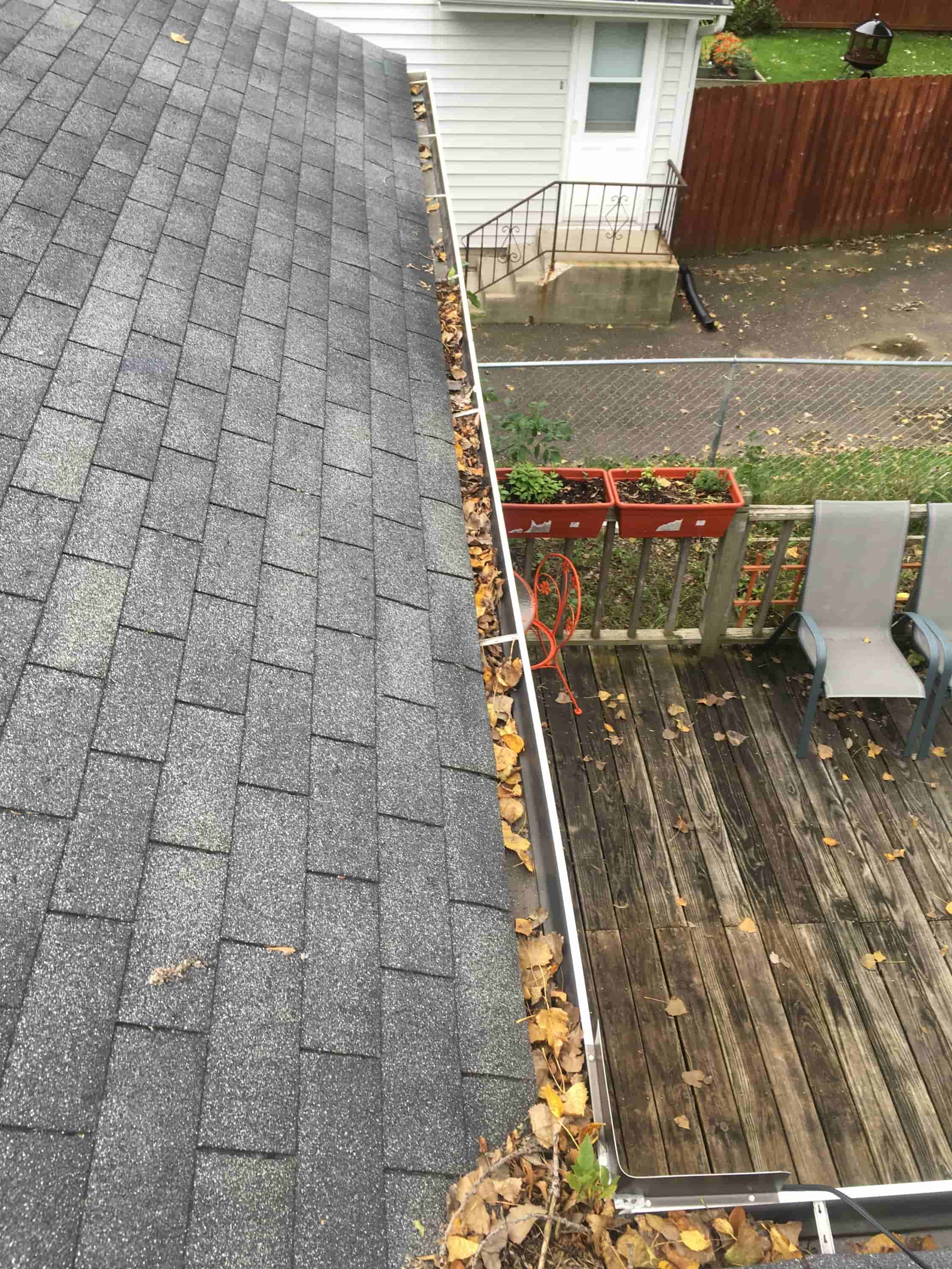 cleaning leaves from gutters