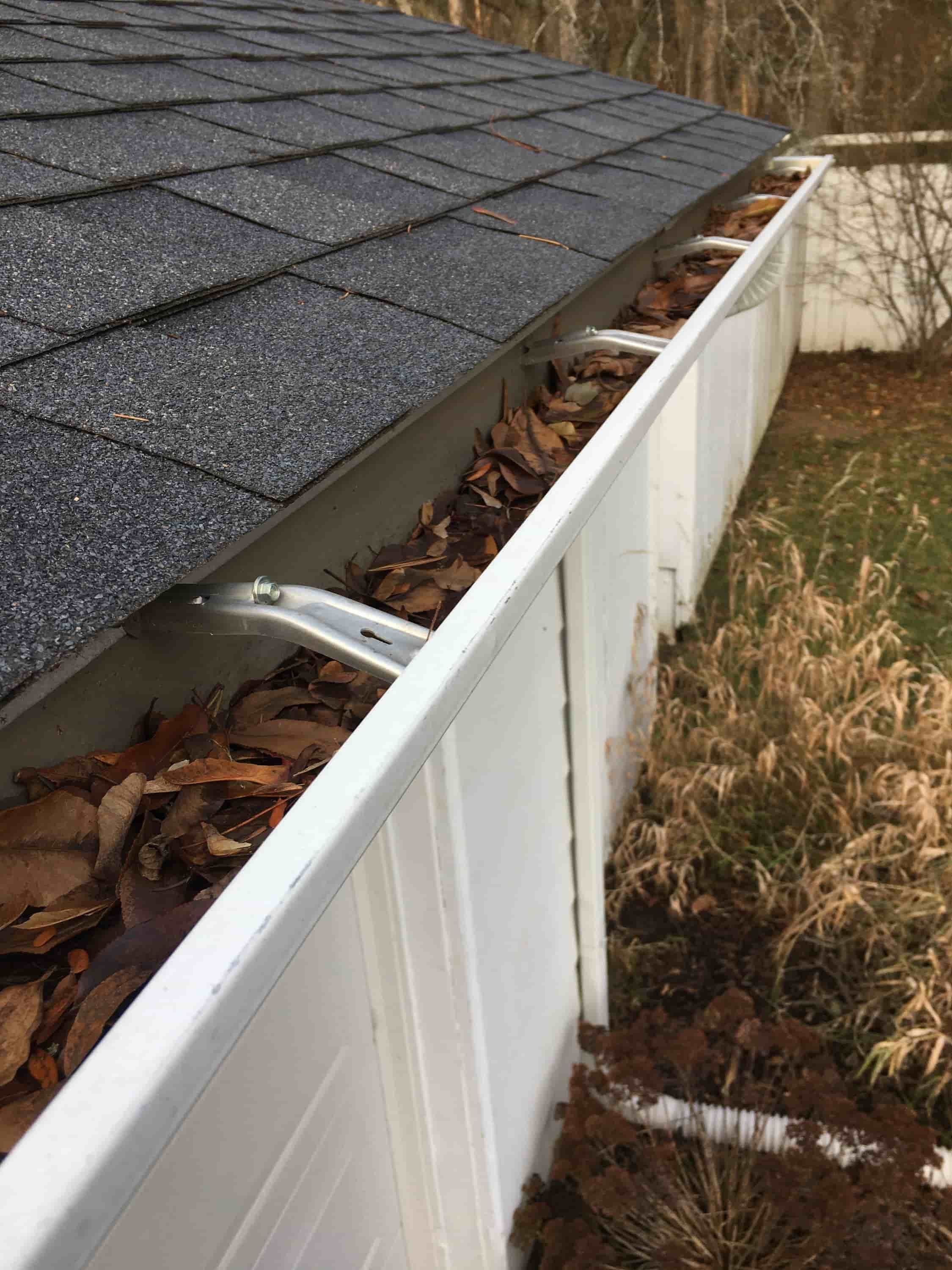 cleaning leaf guard gutters