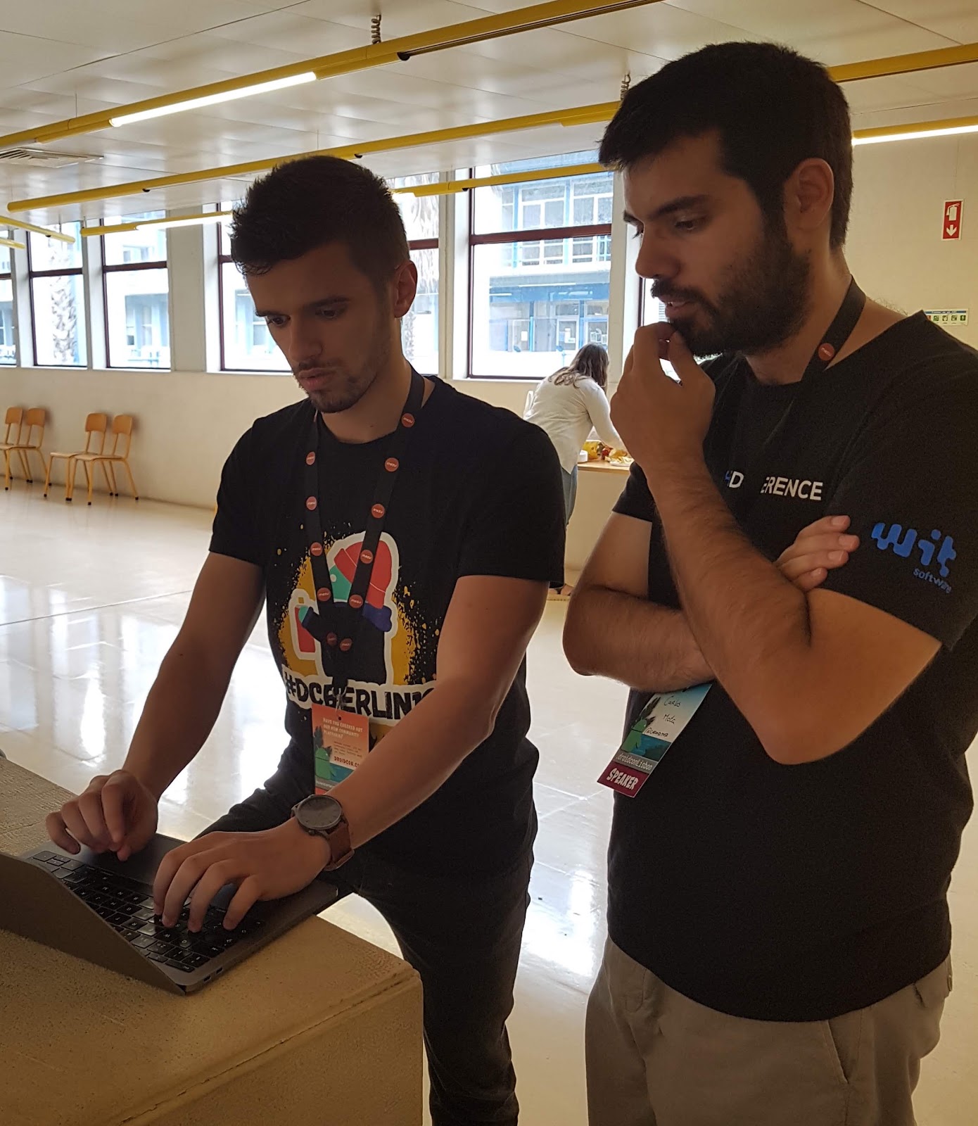 Ricardo on the left with fellow GDG
      lead planning DevFest Coimbra