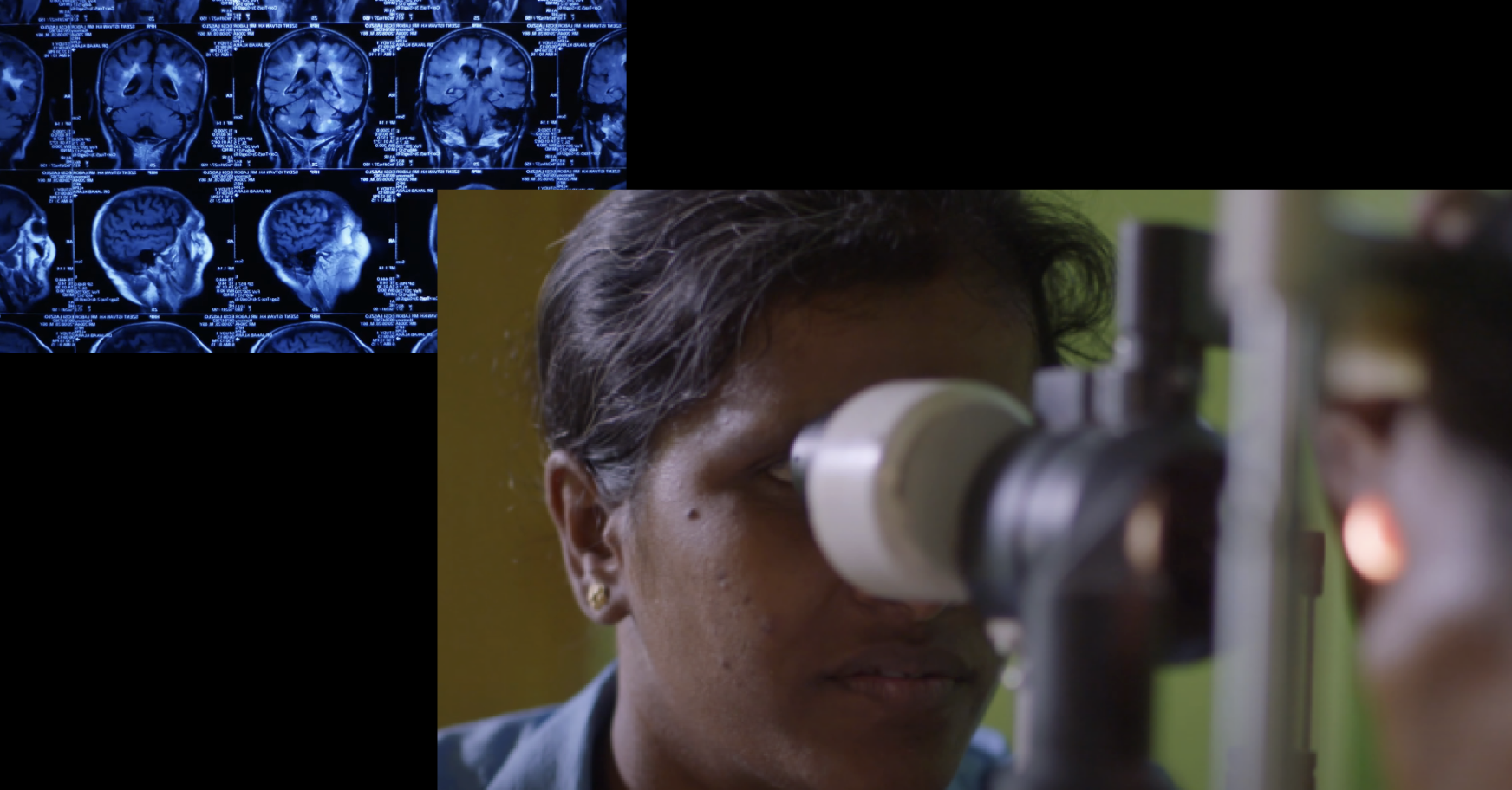 Woman looking in microscope