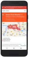 Teléfono móvil muestra alerta de inundación severa en el Río Ganges.