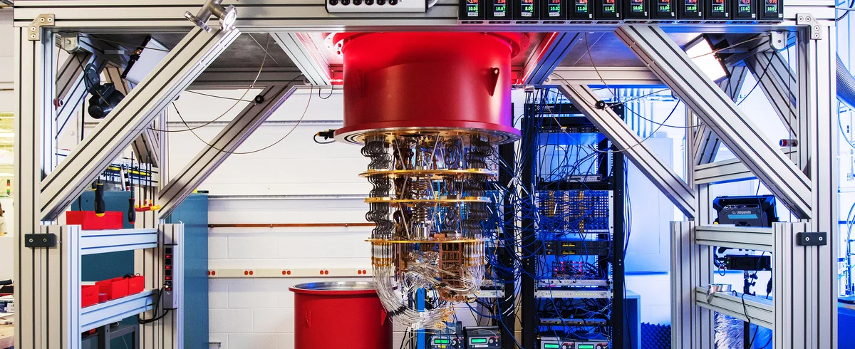 Photograph of a quantum lab, showing a large hardware with wiring