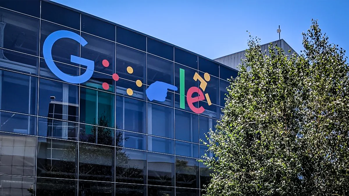 Google logo on Google's main campus building B43 featuring Braille as the ‘o’s, ASL for ‘g’, and a wheelchair user as ‘e’.