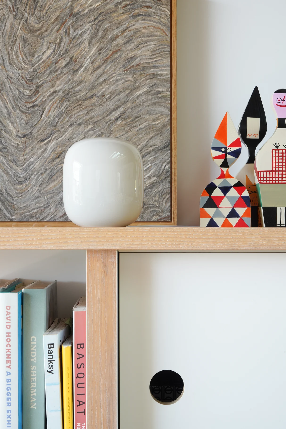 The Nest Wifi Pro sitting on a shelf