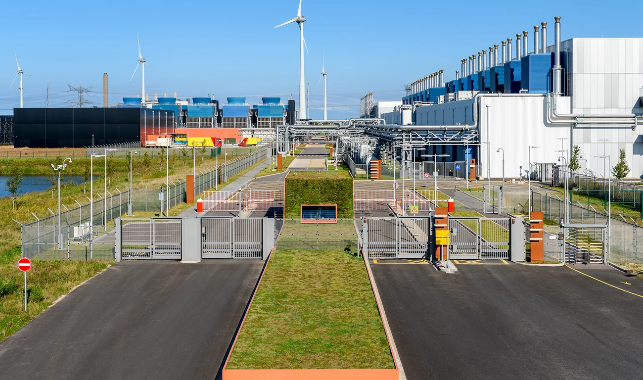 A photograph showing multiple security gates outside a Google data center.