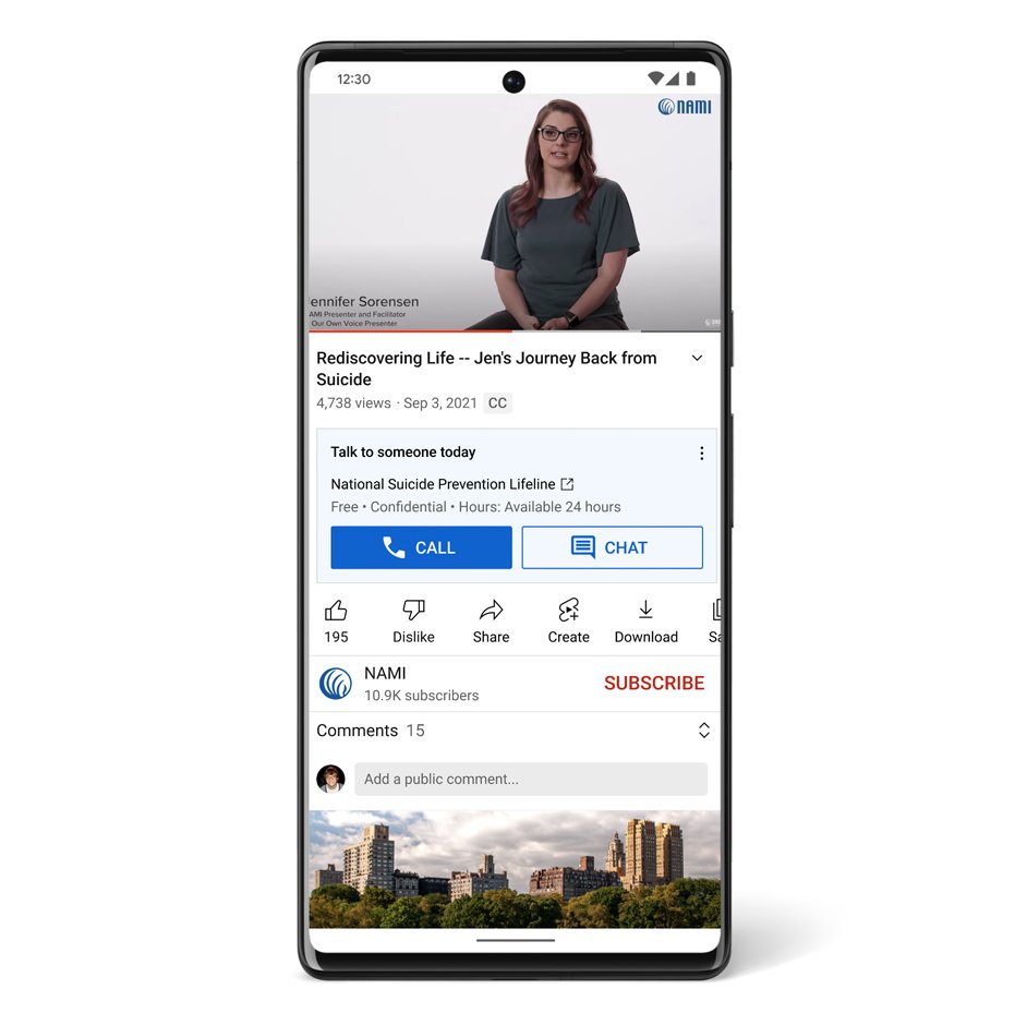A phone screen shows a YouTube video with a panel underneath that has contact information for the National Suicide Prevention Lifeline.